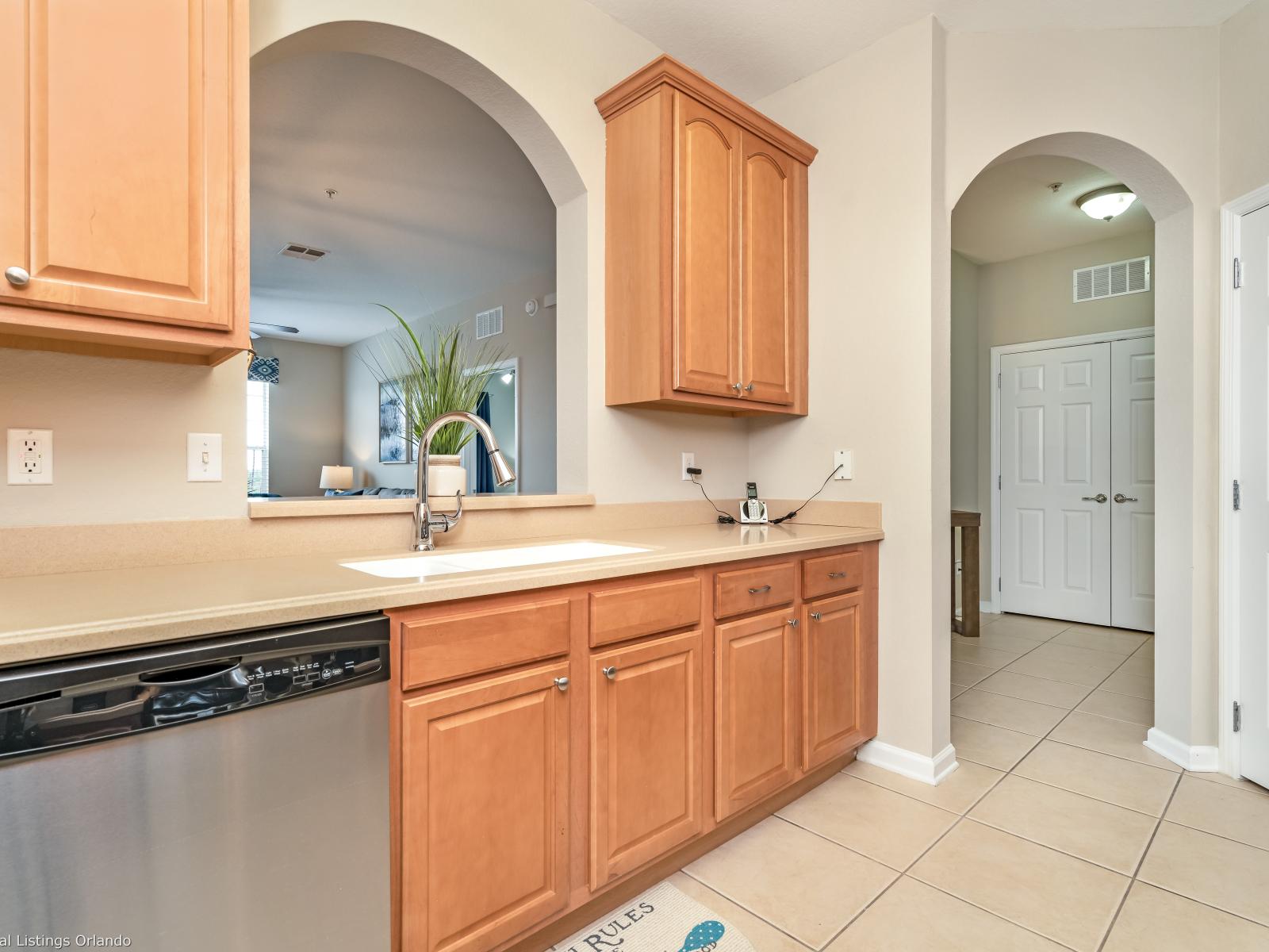 This fully equipped kitchen is a chef's dream, boasting modern appliances and ample space to unleash culinary creativity and prepare delicious meals with ease.