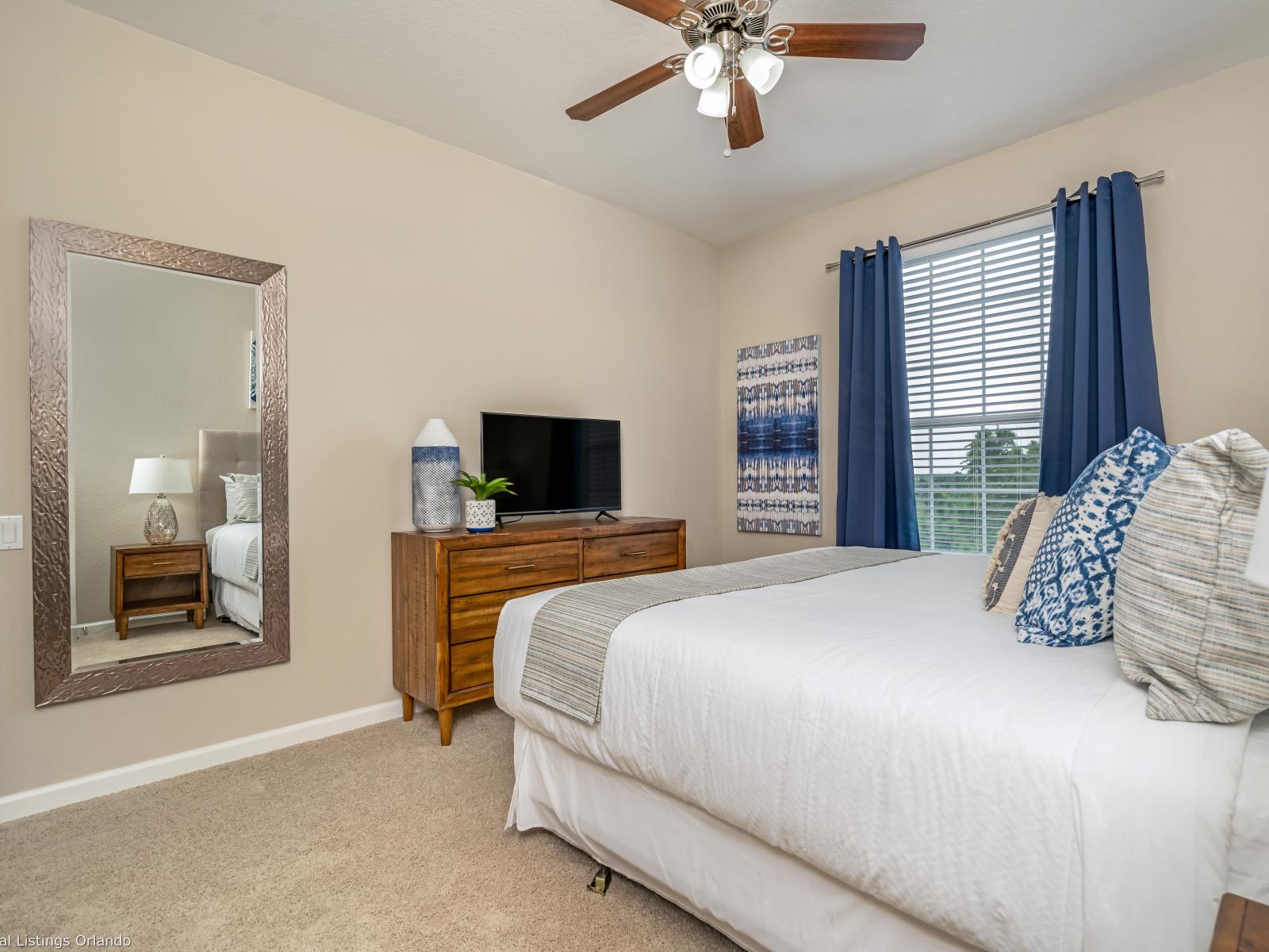 With its spacious layout and elegant decor, this room provides a serene ambiance for unwinding after a long day of exploring. Whether you're catching up on your favorite TV show or simply enjoying a restful night's sleep.