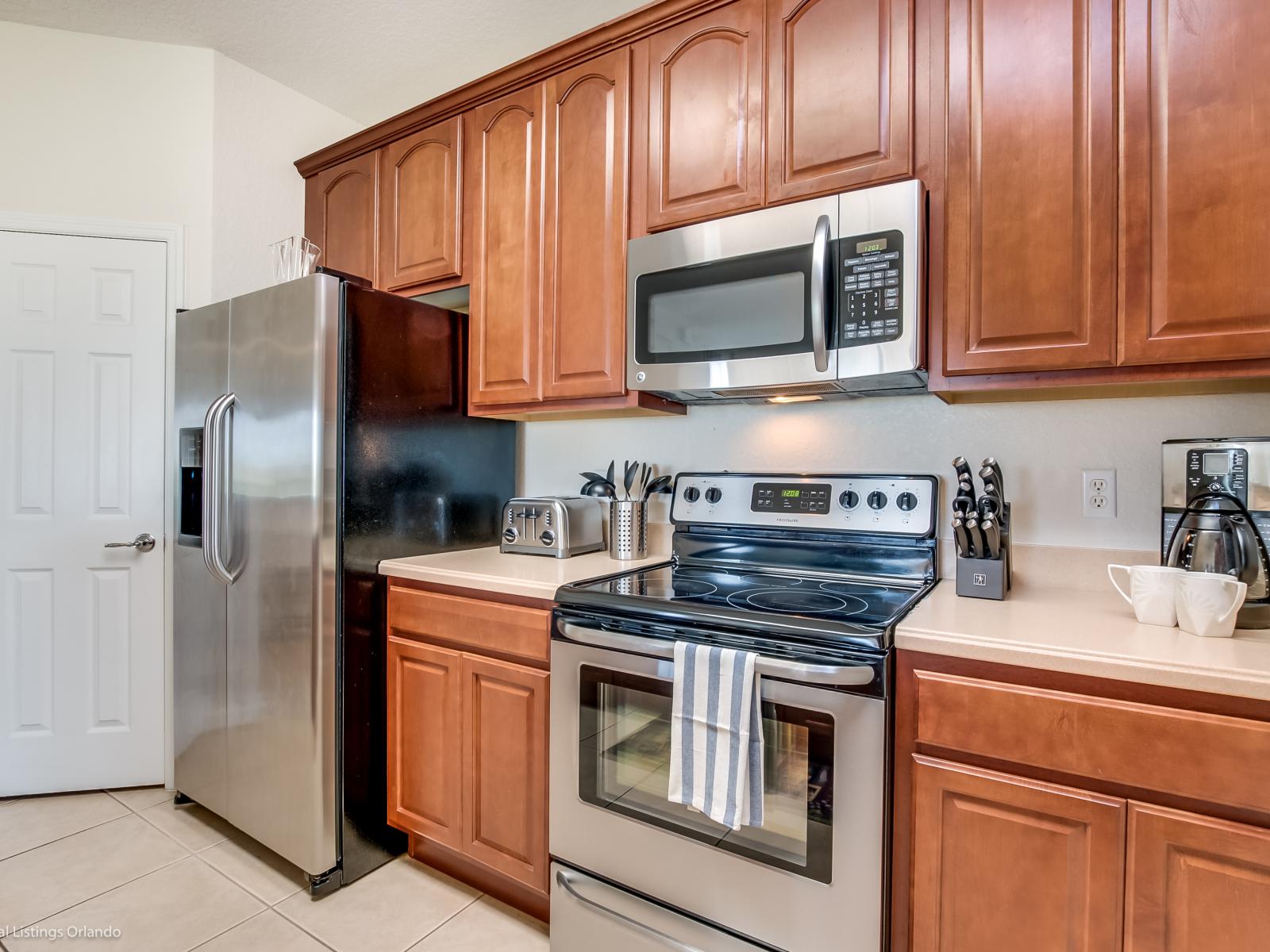 Kitchen Sophistication: Elevate your culinary experience in our condo's fully furnished kitchen, where an open layout and contemporary design come together seamlessly