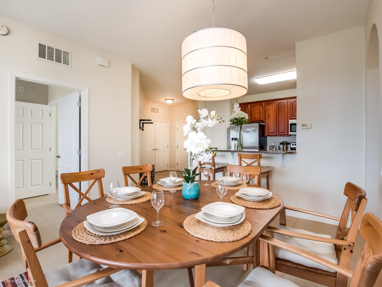 Dining in Style: Experience the epitome of elegance in our condo's dining area, adorned with sleek and sophisticated chairs for a luxurious dining experience