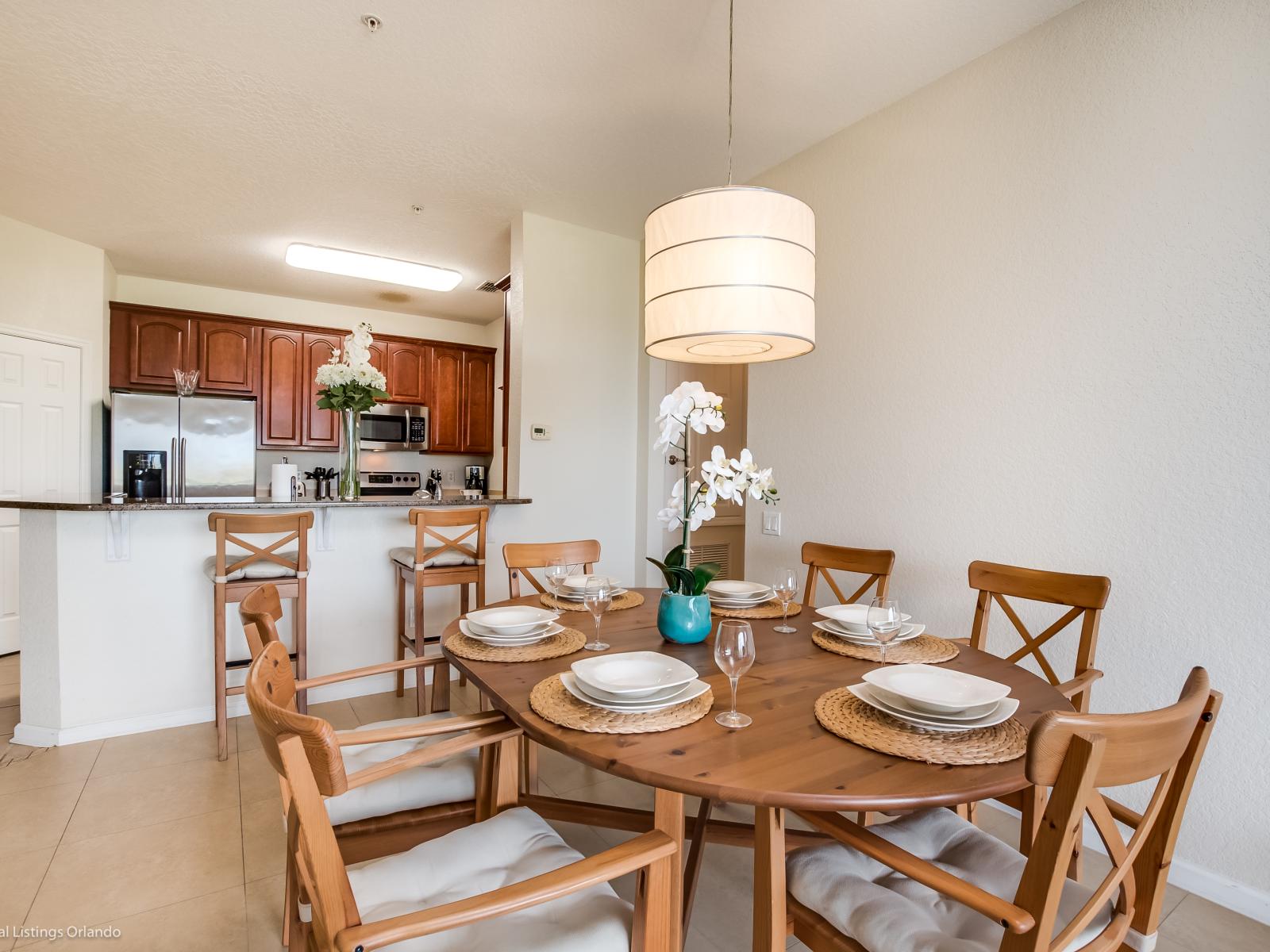 Dining in Style: Experience the epitome of elegance in our condo's dining area, adorned with sleek and sophisticated chairs for a luxurious dining experience