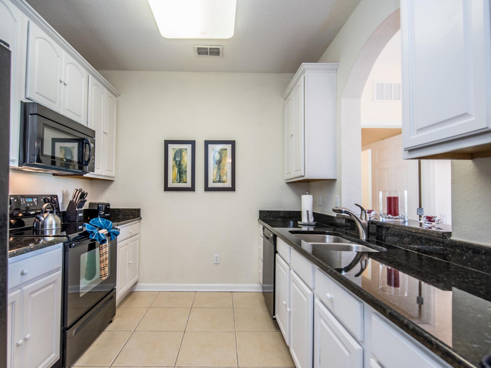 The bright and airy kitchen has all the appliances and is equipped with all the comforts of home.