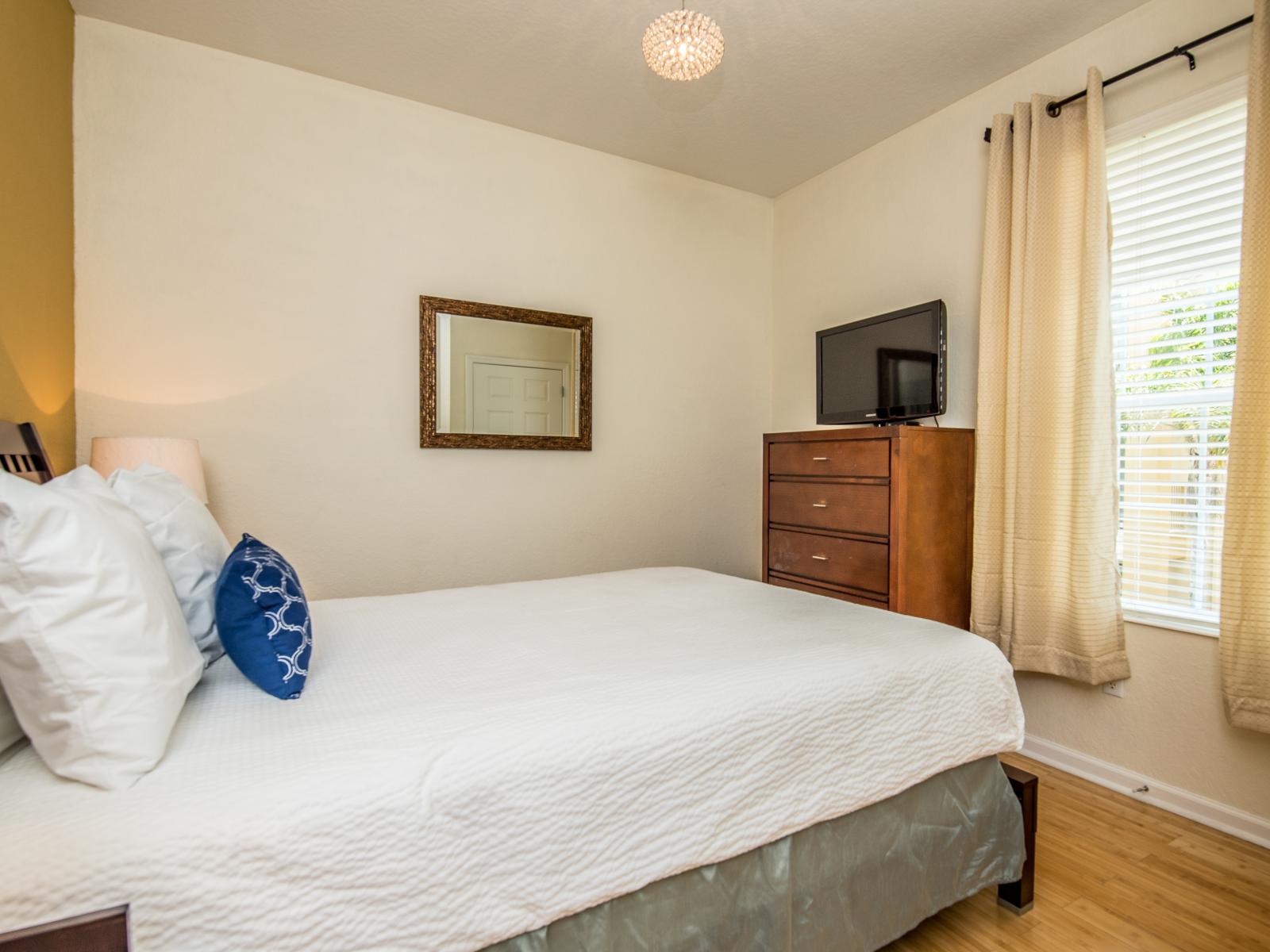 Comfy pillows and a good book, the ultimate relaxation for a good vacation can be found in this luxurious cozy bedroom.