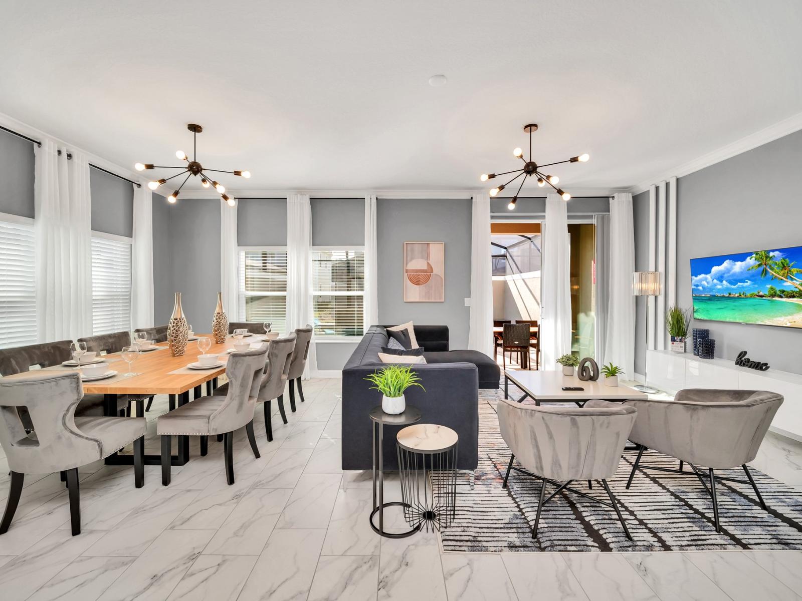 The living/dining area is a harmonious blend of style and comfort. With contemporary furnishings, a chic color palette, and ample natural light, this space invites you to relax and entertain.