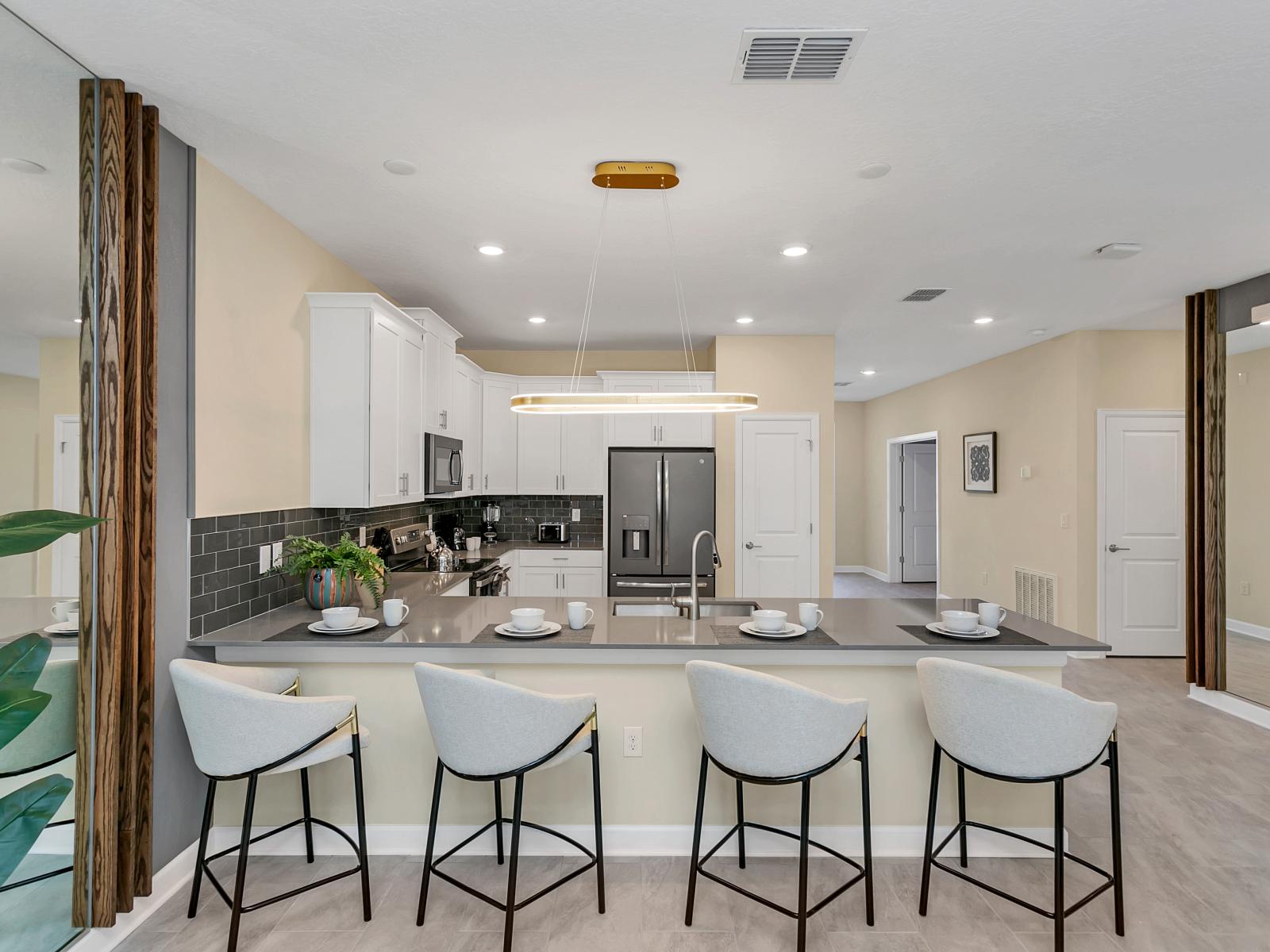 Our Fully Equipped Kitchen Boasts State-of-the-Art Appliances, Ample Counter Space, and Sleek Cabinetry, Making It the Perfect Hub for Culinary Adventures and Gourmet Delights.