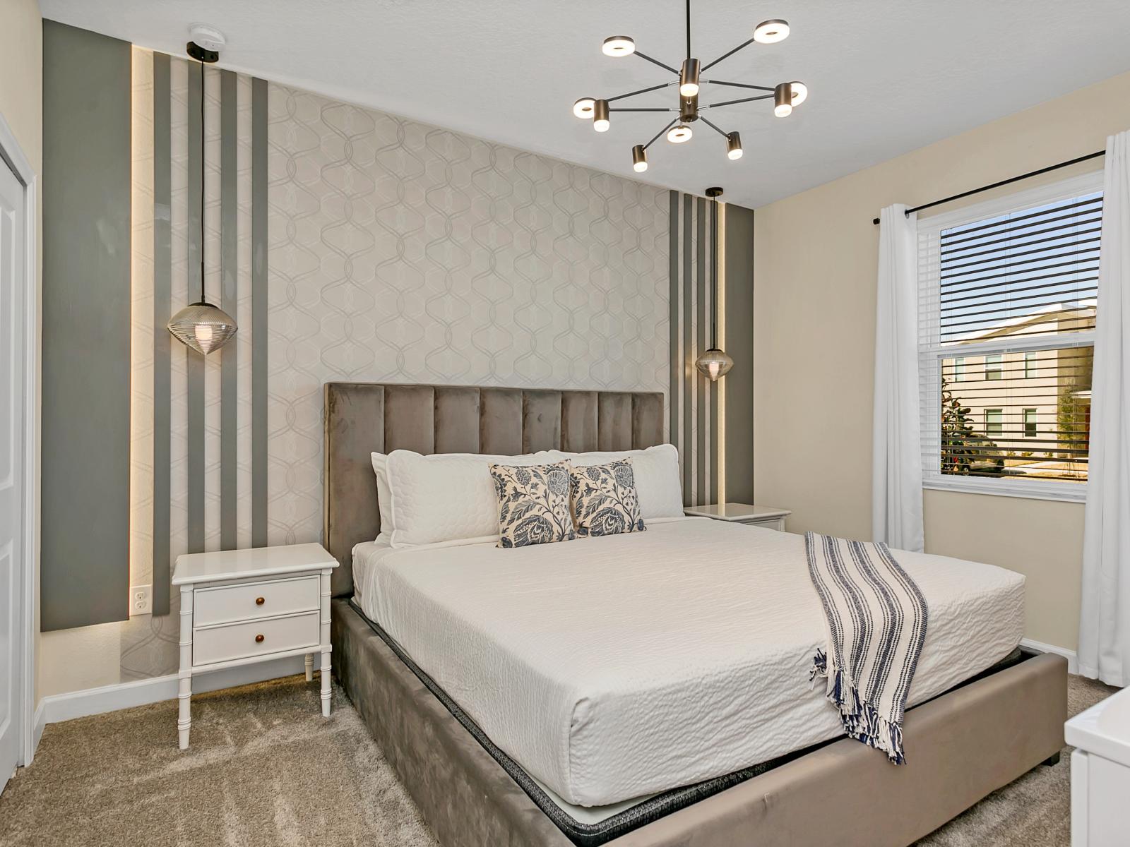 Deluxe bedroom of the home in Kissimmee Florida - Spacious bedroom offering comfort and style - Cozy retreat with a plush double bed, perfect for relaxation - Beautiful views from the window