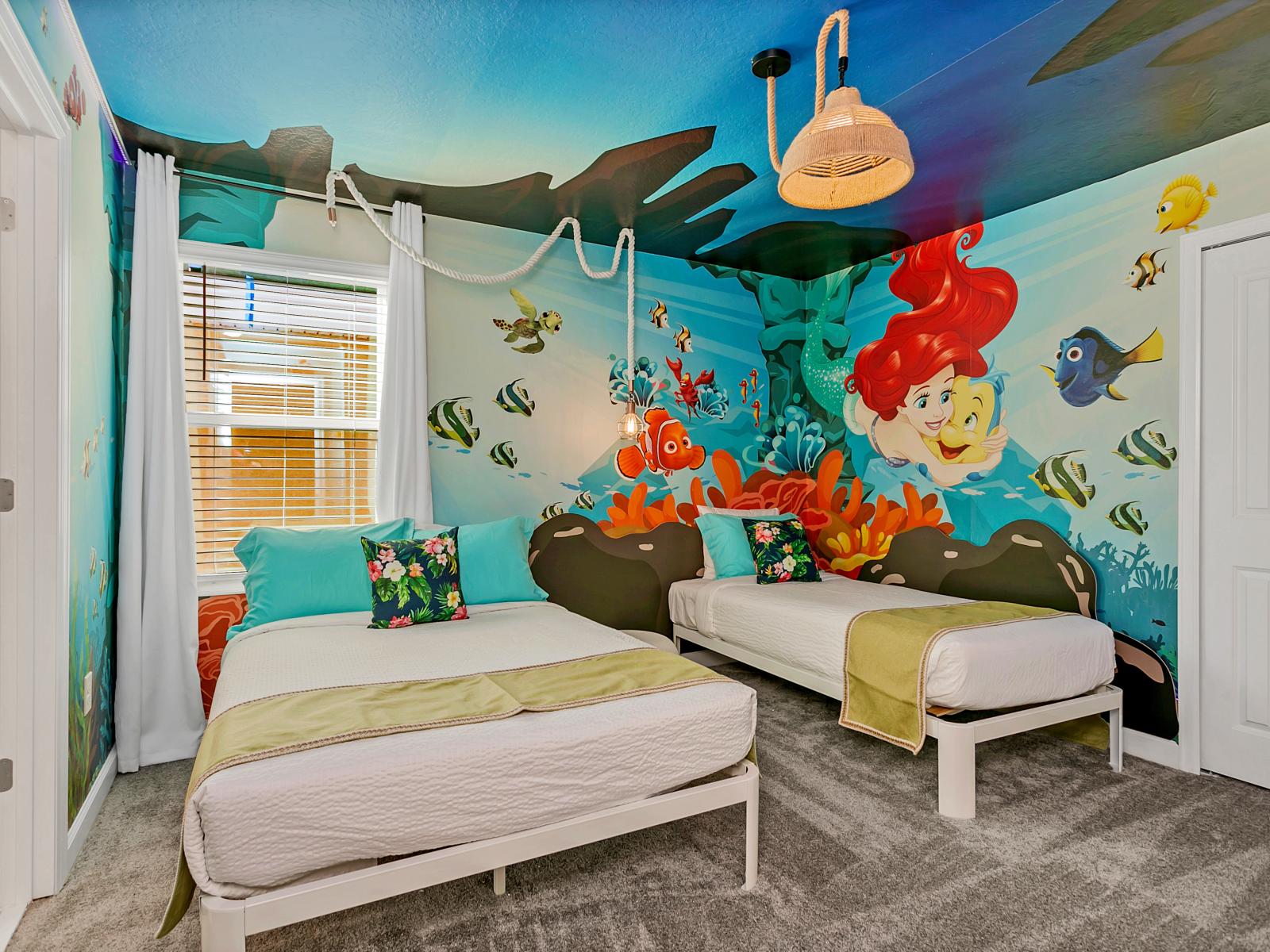 The Little Mermaid themed bedroom of the home in Kissimmee Florida - Featuring one double bed and one single bed - Lest get lost into the world of mermaids - Plush bedding and pillows for a luxurious feel