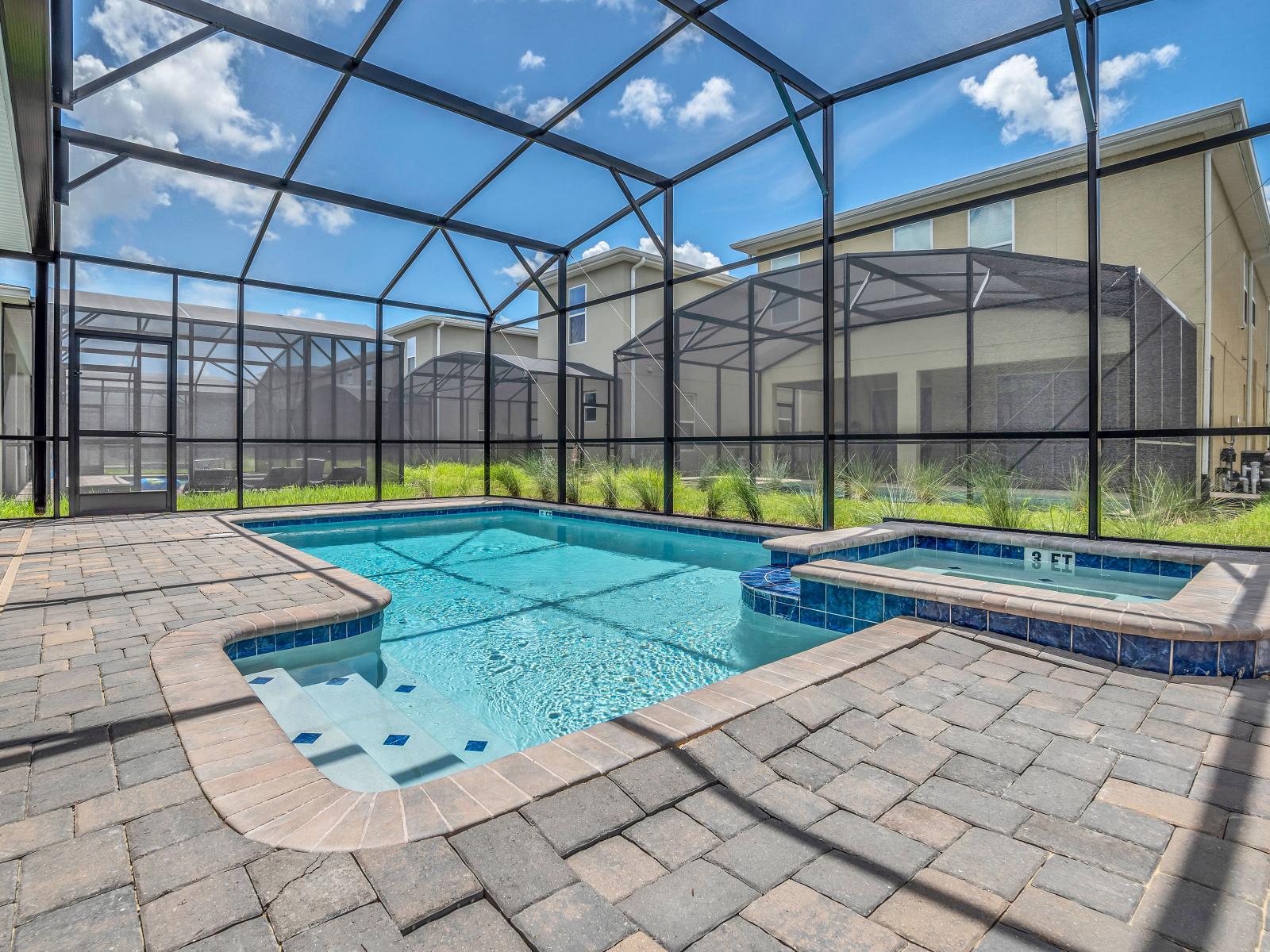 Stunning Pool in of the Apartment in Florida near  Lake Nona Town Center - Immerse yourself in the cool elegance of pool - Inviting pool area for a perfect getaway - Crystal-clear pool for refreshing dips