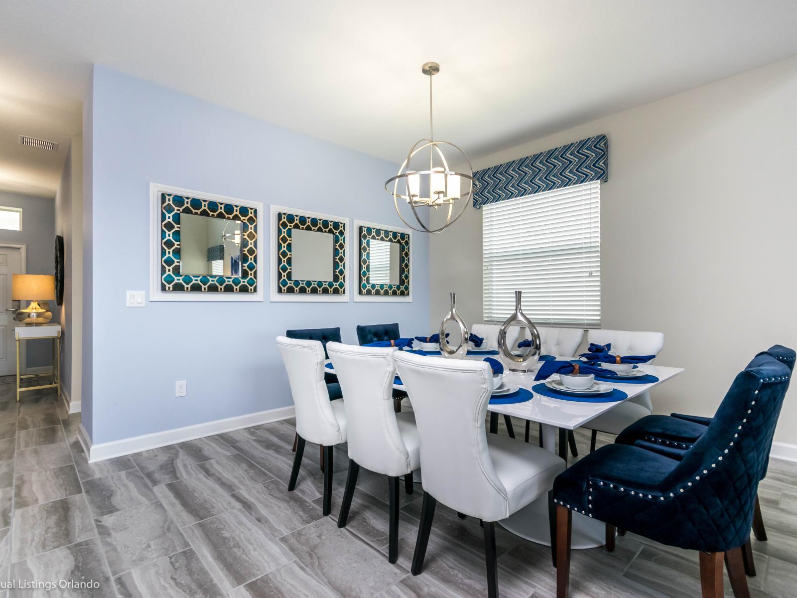 Gather 'round our expansive ten-seater dining table, seamlessly connected to both the living area and kitchen.