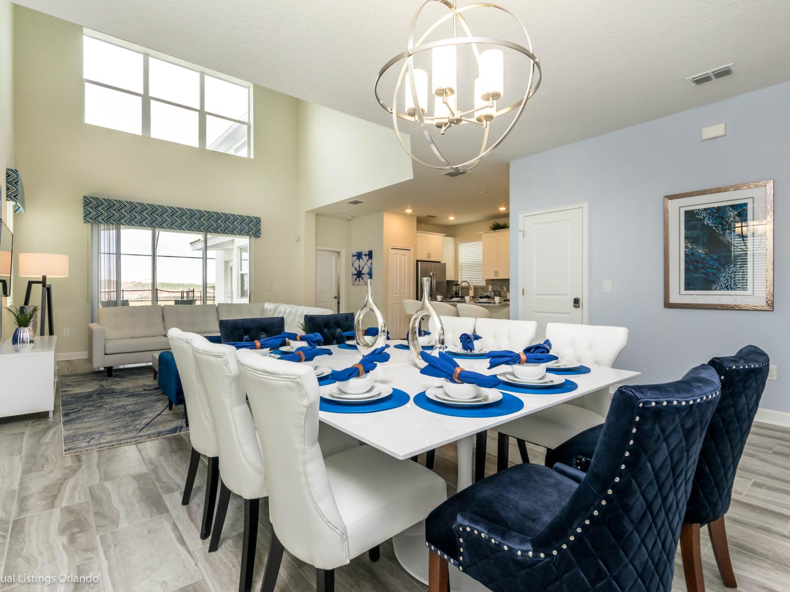 Dine in elegance: Our ten-seater table offers effortless access from the living area and kitchen, perfect for hosting gatherings.