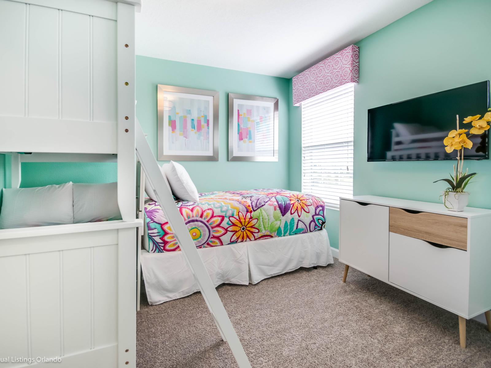 Charming and cozy: Our beautiful bedroom features a bunk bed, single bed, and a Smart TV with Netflix for endless entertainment.