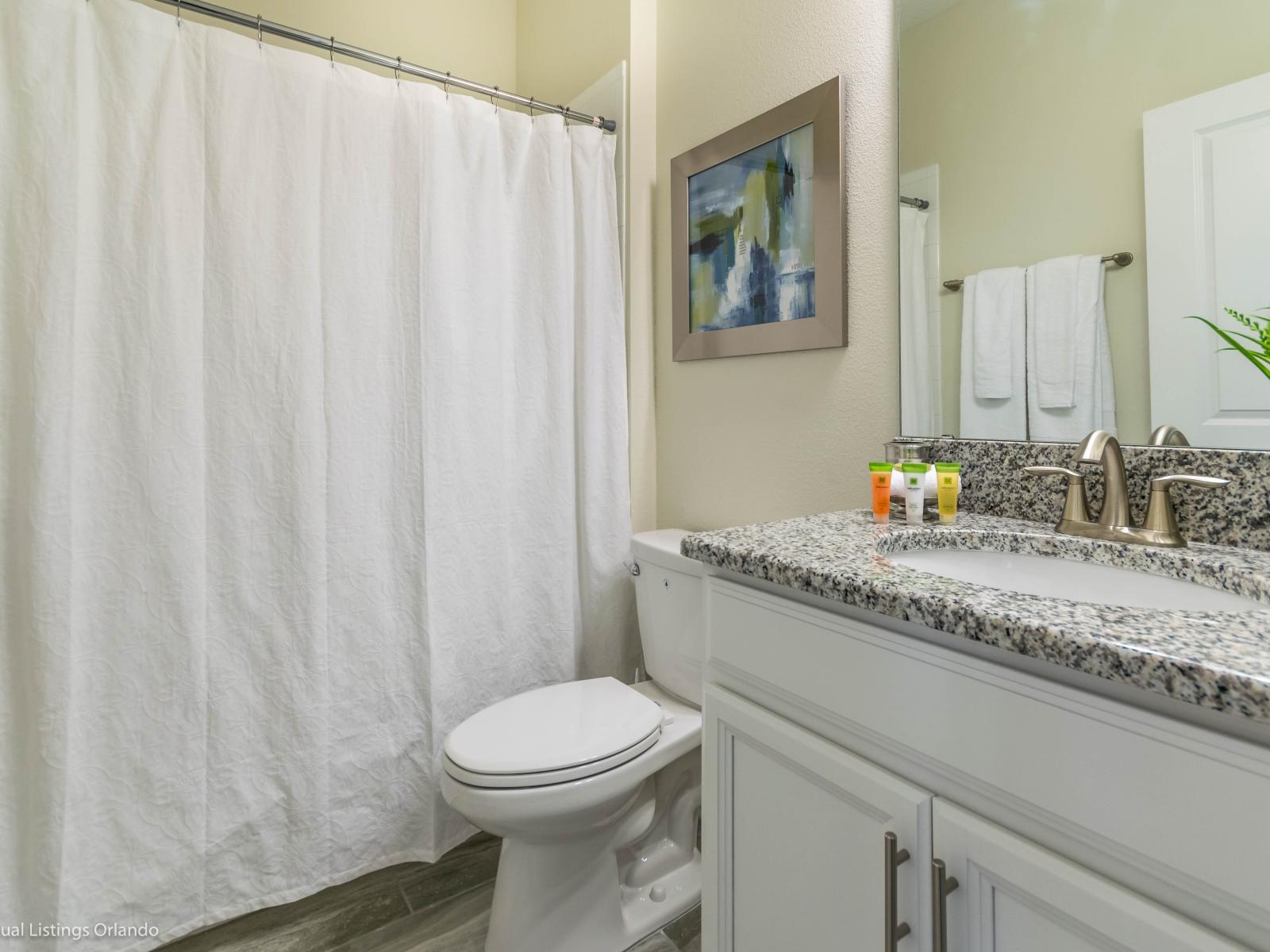 Step into freshness: Enjoy the pristine cleanliness of our sparkling bathroom.