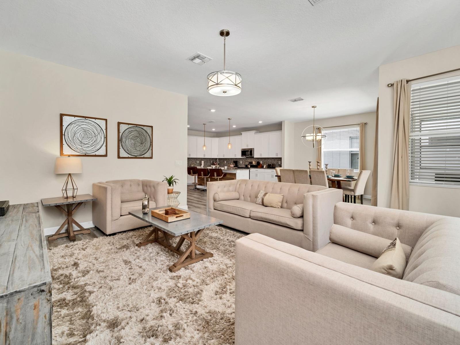 Sink into comfort in our inviting living room, where plush seating and warm decor create a welcoming ambiance for relaxation and quality time with loved ones.