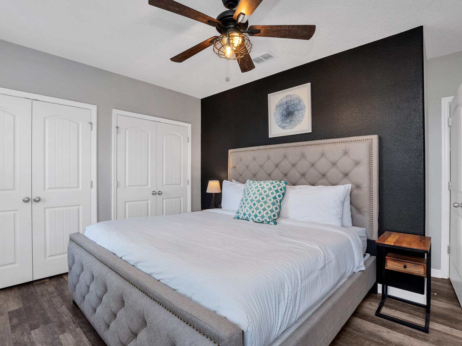 Deluxe bedroom of the townhouse in Davenport Florida - Spacious bedroom offering comfort and style - Plush double bed for restful nights - Bedroom with a cozy ambiance, blending comfort and aesthetics