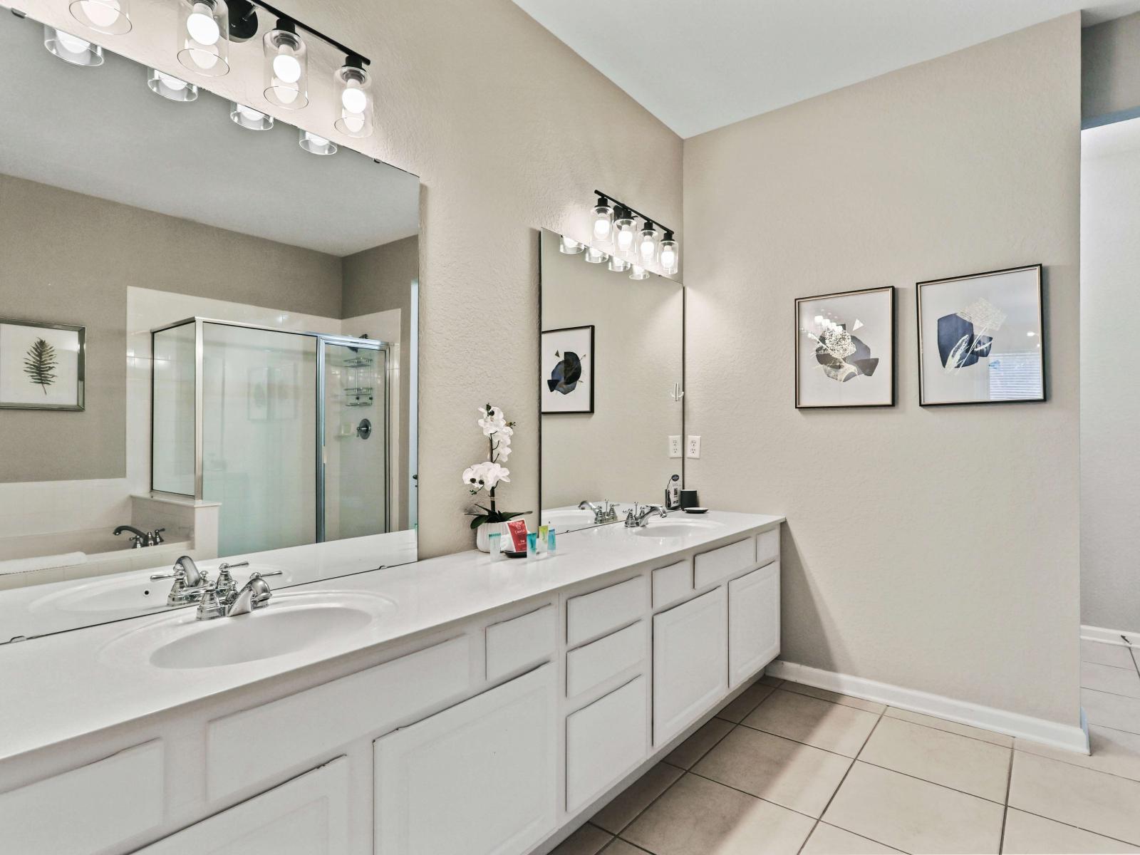 Spa-like Serenity: Indulge in luxury in our condo's master bathroom – a serene space where relaxation and modern design come together.