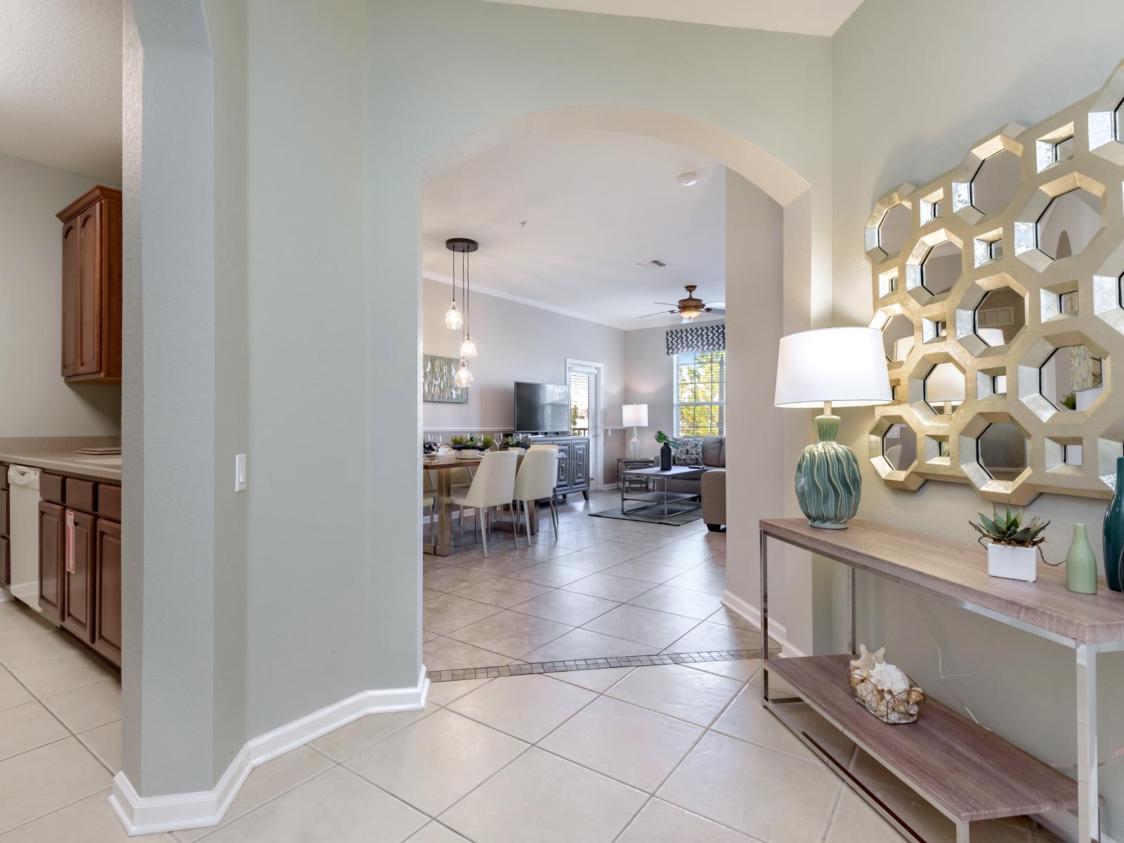 Welcome to the Heart of the Home: A glimpse down the hallway leading to the inviting living area, promising comfort and relaxation.