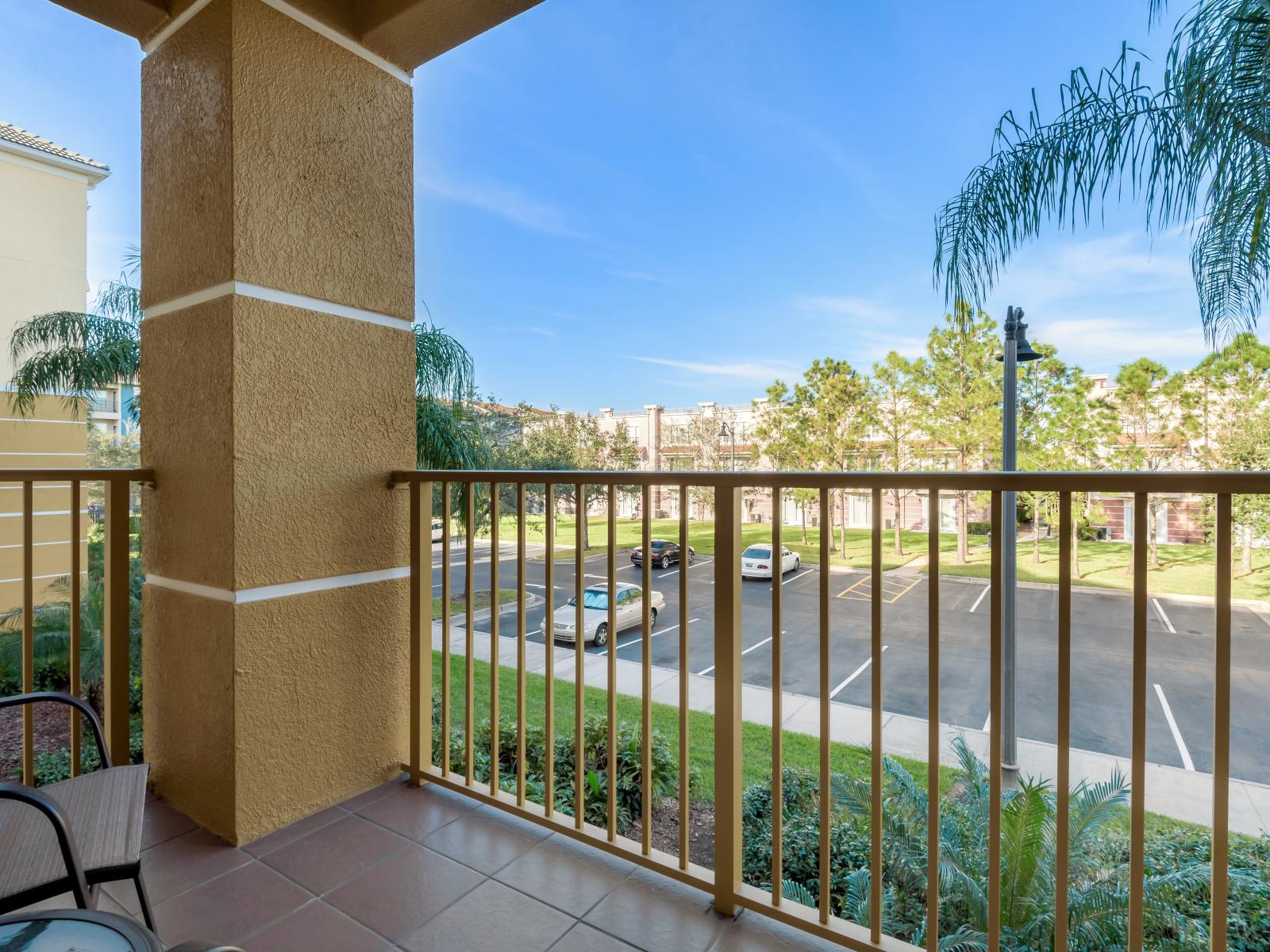 Step out onto this balcony and immerse yourself in the vibrant atmosphere of Vista Cay Resort. With the clubhouse and main pool just steps away, enjoy convenient access to resort amenities and endless relaxation.