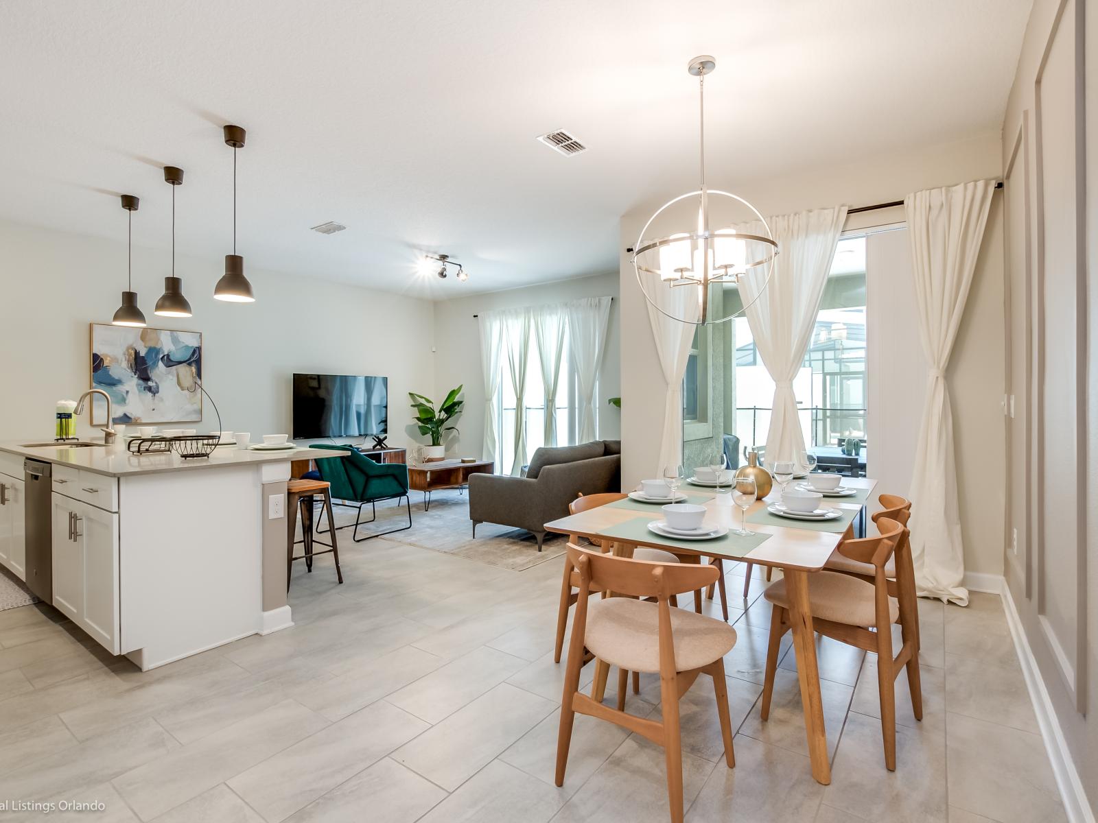 Open plan townhouse in Kissimmee Florida - Seamlessly integrated near the kitchen counter and living area - Thoughtfully curated decor adding personality - Well-planned layout maximizing comfort and functionality