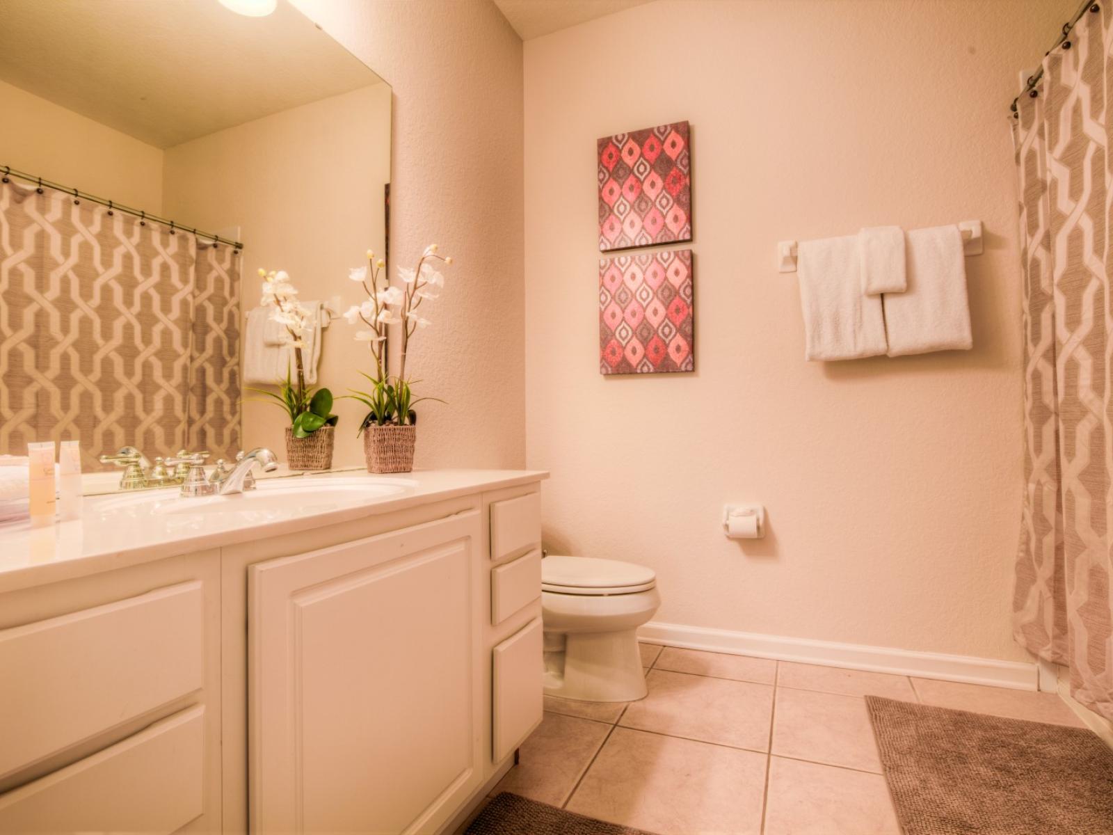 Indulge in the second bathroom's tub/shower combination, offering a tranquil space to unwind and refresh after a day of adventure.