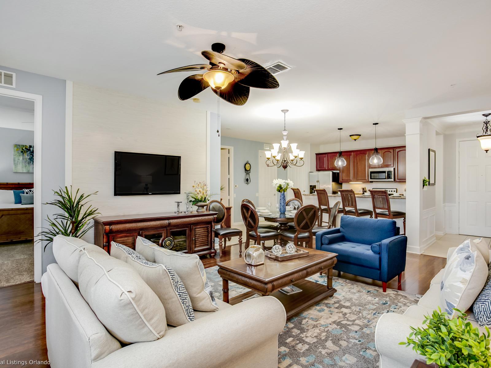 Relaxation Oasis: Sink into the sumptuous sofa, surrounded by stylish accents and warm hues, making this living room a true haven for relaxation