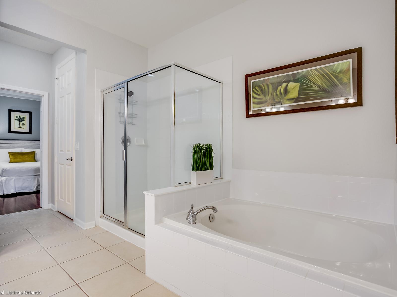 Pampering Paradise: Welcome to the bathroom with enclosed shower, where indulgence meets luxury. A sanctuary for self-care and rejuvenation, promising moments of blissful relaxation in a haven designed for comfort and style.