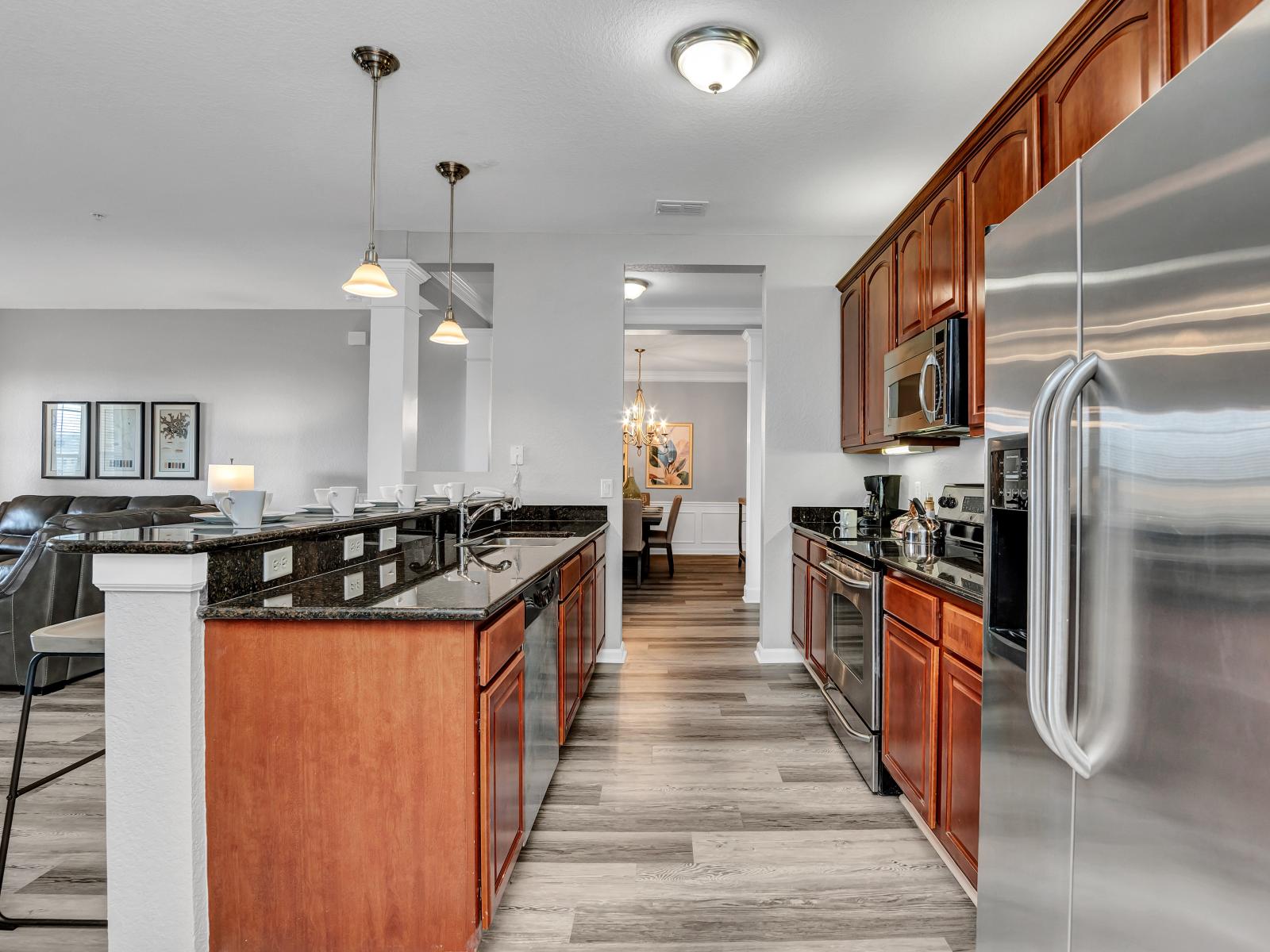 Kitchen:  Revel in ample storage space, ensuring organized and clutter-free counters for seamless meal preparation.