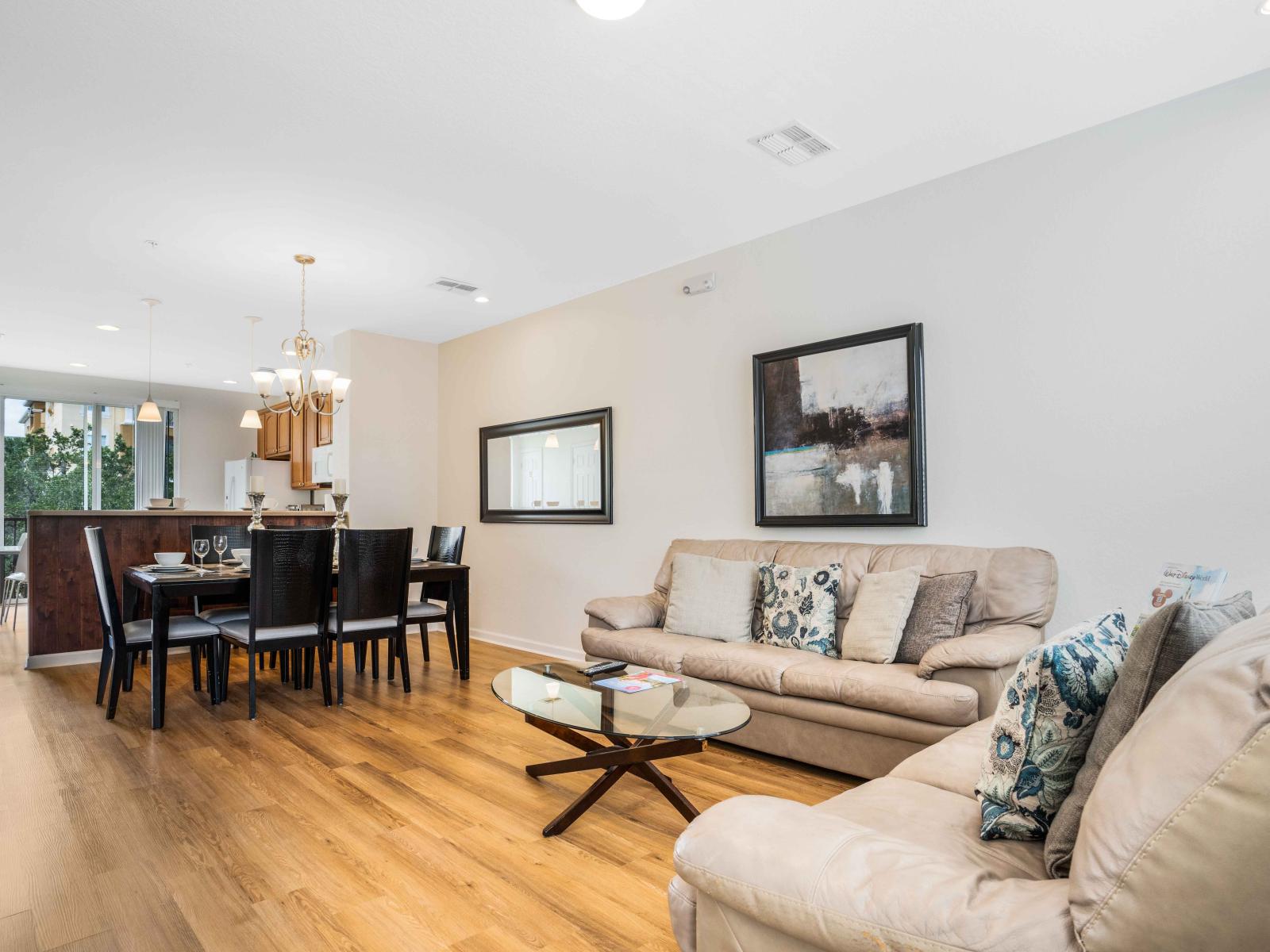 Seamless elegance unfolds in this integrated living and dining room – where every corner whispers comfort and sophistication, inviting you to gather, dine, and savor the moments in a space that feels like home. Embrace the beauty of sha