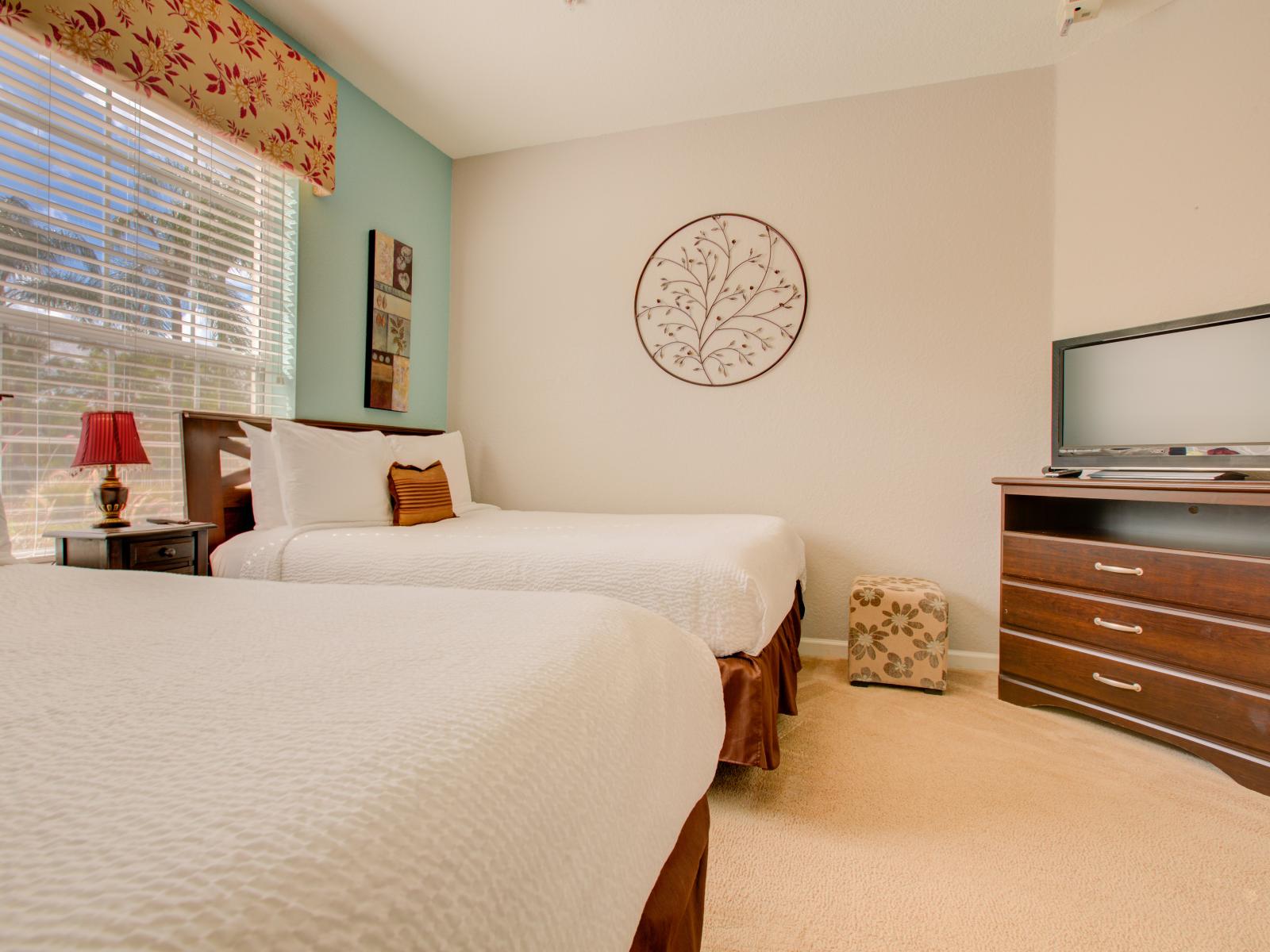 Cozy Comfort: A Two-Bedroom Retreat Offering Ample Space and Serene Ambiance.