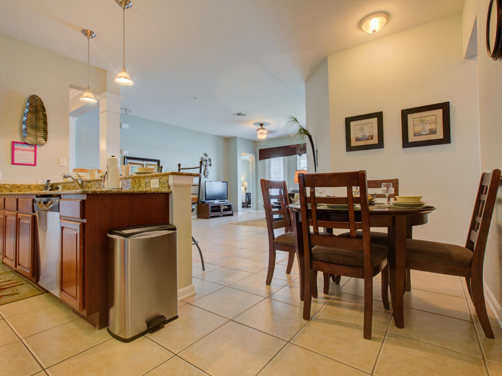 Savor the essence of home in this inviting dining and kitchen space – where culinary delights and shared meals become the heart of every gathering. Embrace the warmth of togetherness amidst stylish design and modern convenience.