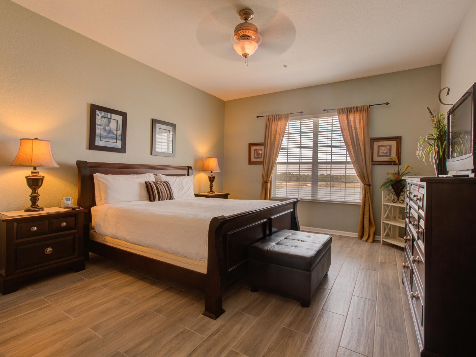 Embrace rustic elegance in this bedroom adorned with wooden furnitures– where natural charm meets timeless style, creating a cozy retreat for rest and relaxation.