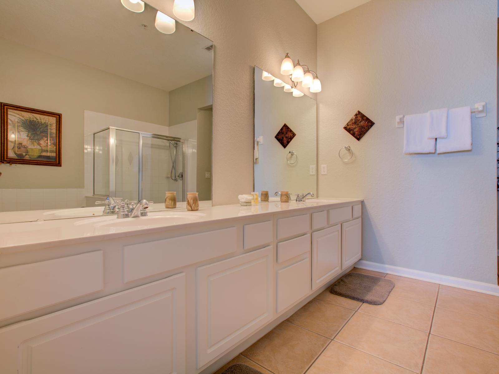 The bathroom is a sanctuary of luxury and relaxation, where elegant design meets comfort, offering a serene escape from the everyday hustle and bustle.