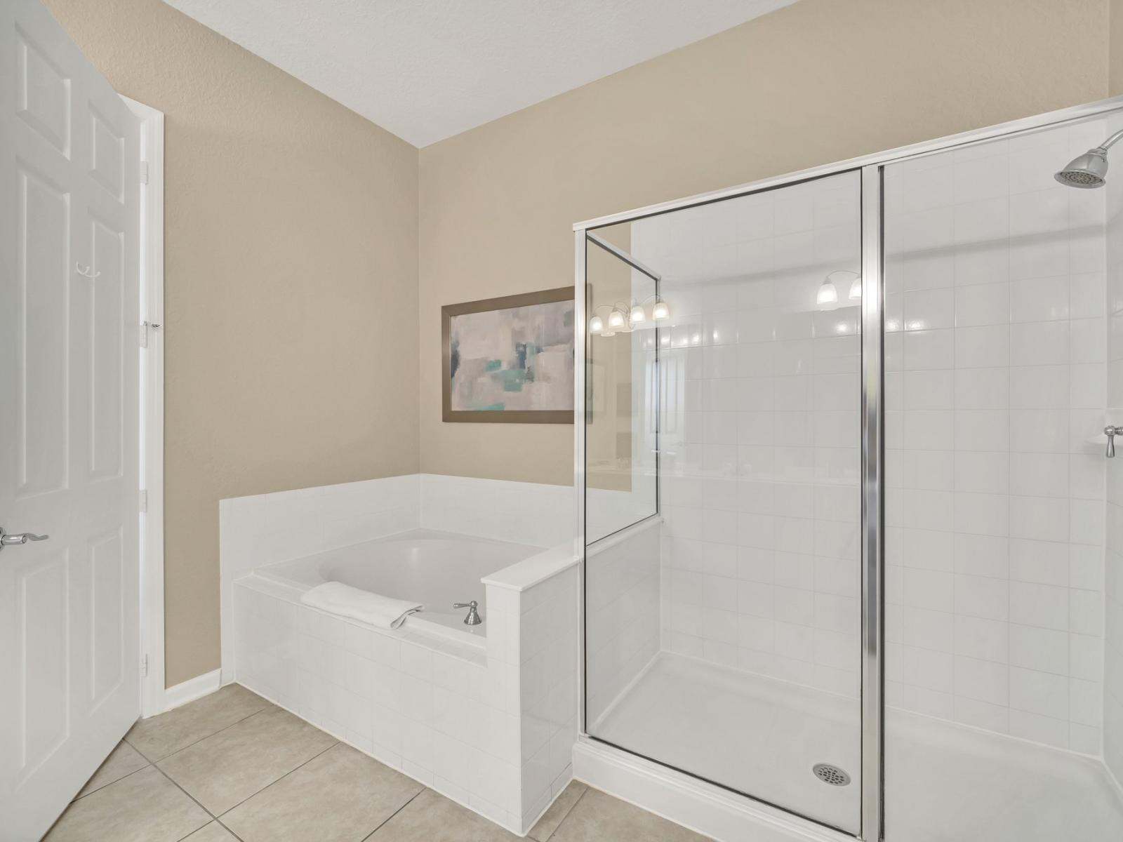 The Bathroom offers a luxurious escape with both a bathtub and walk-in shower. A serene oasis where indulgence meets convenience, promising moments of relaxation and rejuvenation in style.