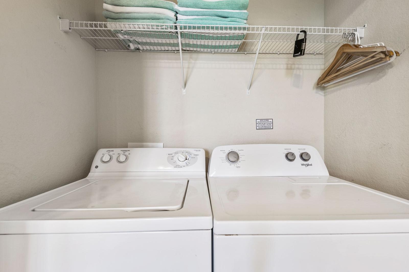 A convenient laundry room with a washer and dryer