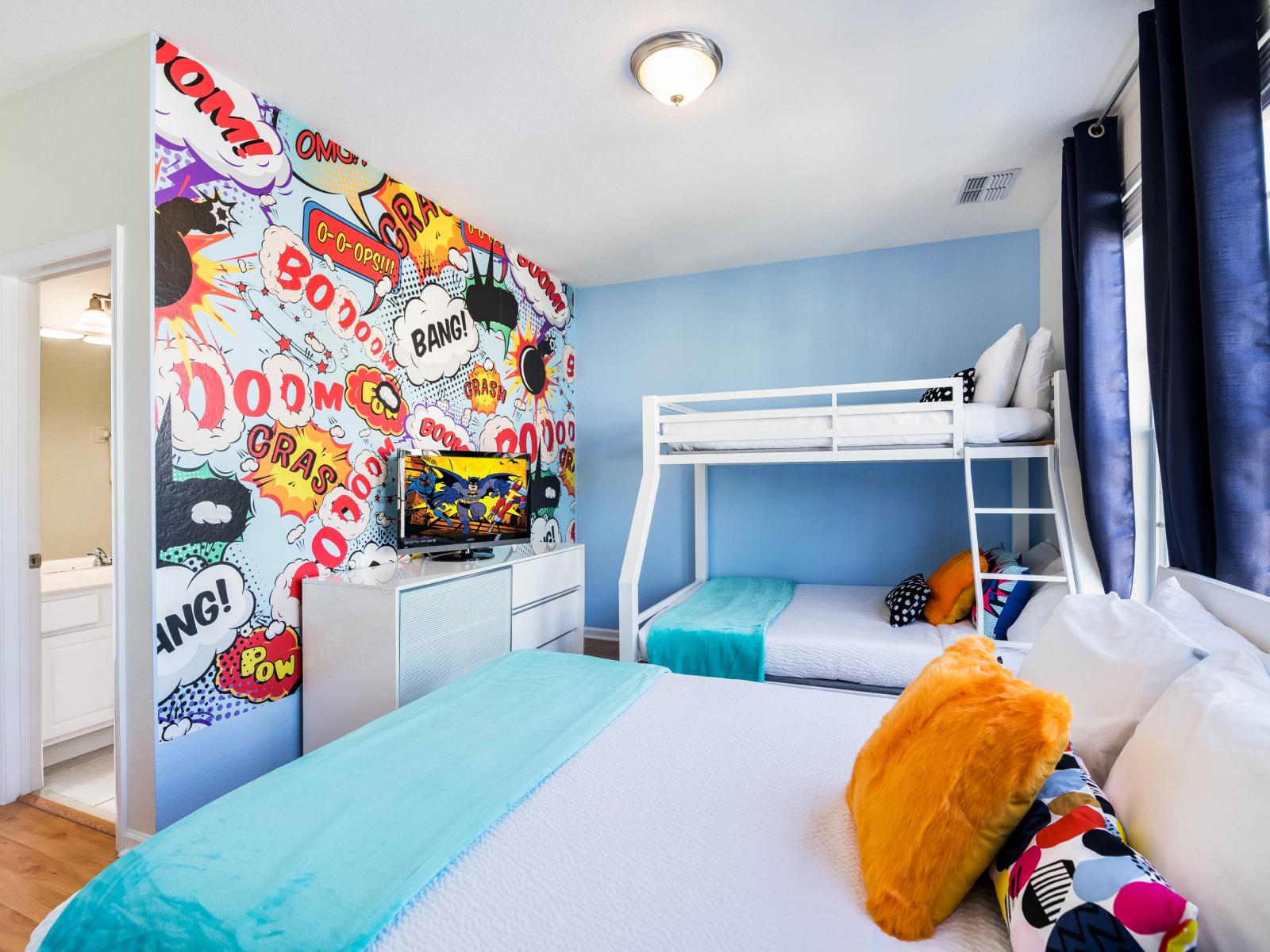 Spark creativity and imagination in our kids' bedroom, featuring a captivating mural accent wall that transforms the room into a magical haven for little dreamers.