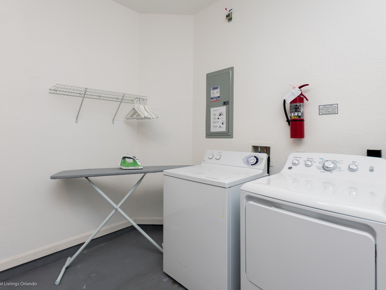 Effortlessly tackle laundry day in our well-equipped laundry room, complete with an iron and ironing table, ensuring your clothes look their best with every wear.