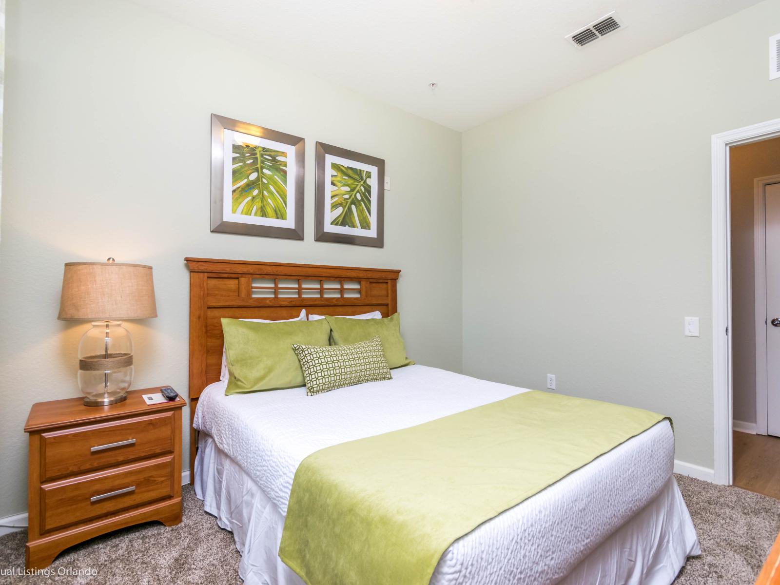 This bedroom radiates a timeless tranquility, offering a serene retreat where simplicity meets sophistication, creating a space of peaceful rejuvenation.