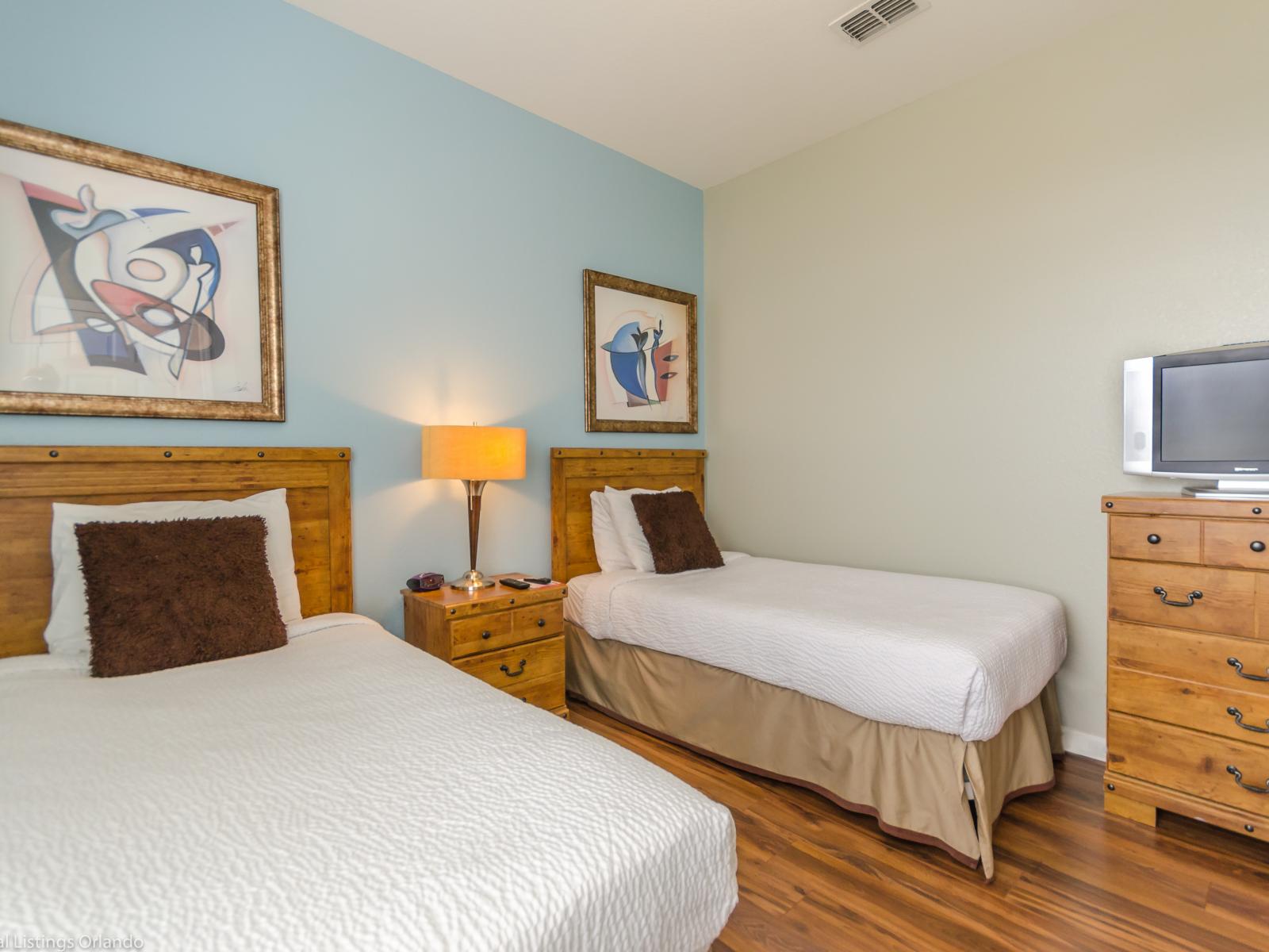 Our bedroom with two single beds offers comfort and flexibility for your stay.