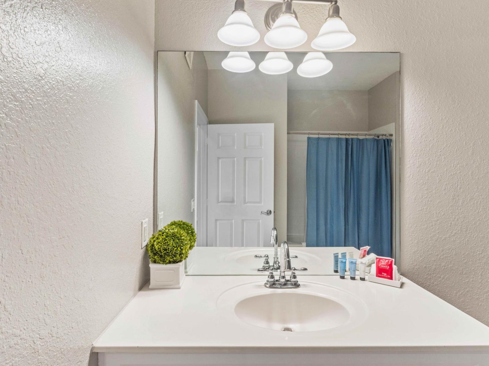 Relax and rejuvenate in Bathroom 2, featuring a luxurious bathtub and shower combo, offering the perfect balance of indulgence and convenience for your bathing rituals. Immerse yourself in soothing bubbles or enjoy a refreshing shower.