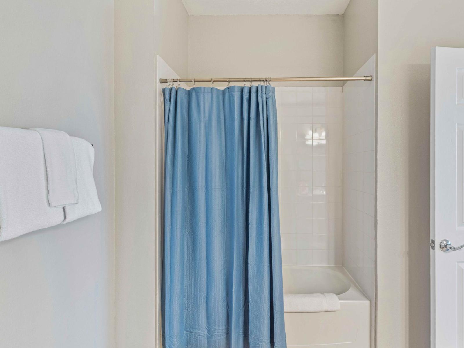 Experience the best of both worlds in Bathroom 2, boasting a luxurious bathtub and shower combo, offering versatility and relaxation for your bathing preferences.