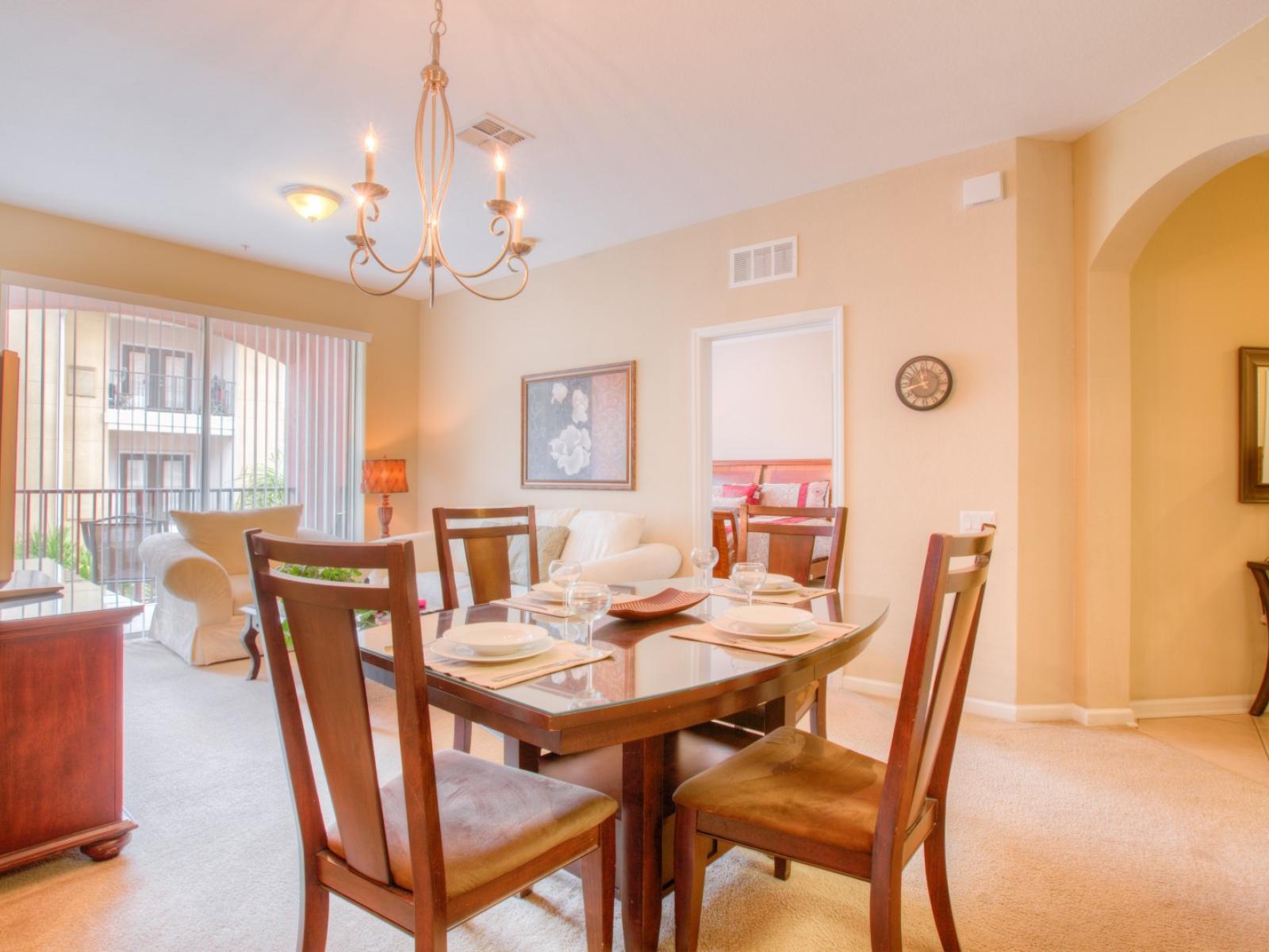 Charming Dining Area of the Apartment in Orlando Florida - 4 Persons Dining - Quality materials, such as a sleek dining table and comfortable chairs - Modern Design - Intimate ambiance created through soft, ambient lighting