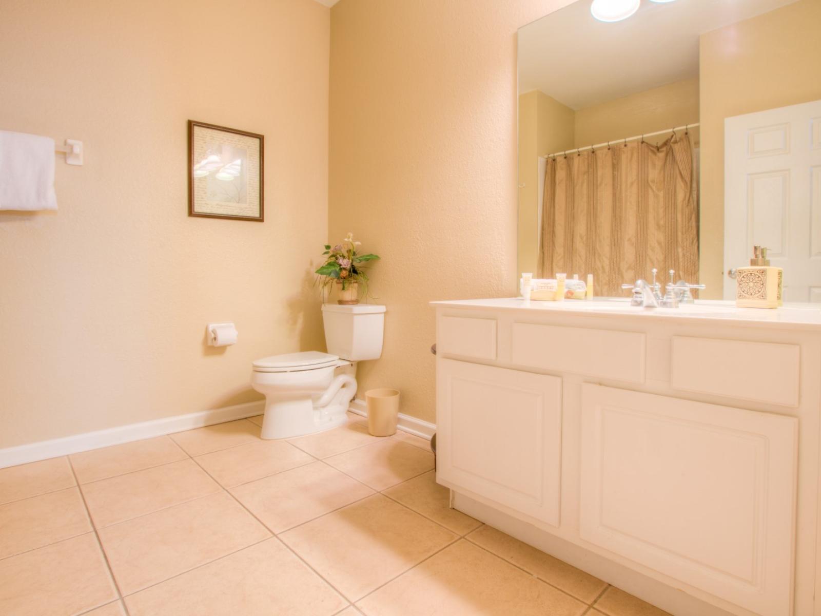 Chic Bathroom of the Apartment in Orlando Florida - Chic design featuring a sleek vanity and upscale lighting - Simplicity meets comfort - Offering a private sanctuary for moments of peace