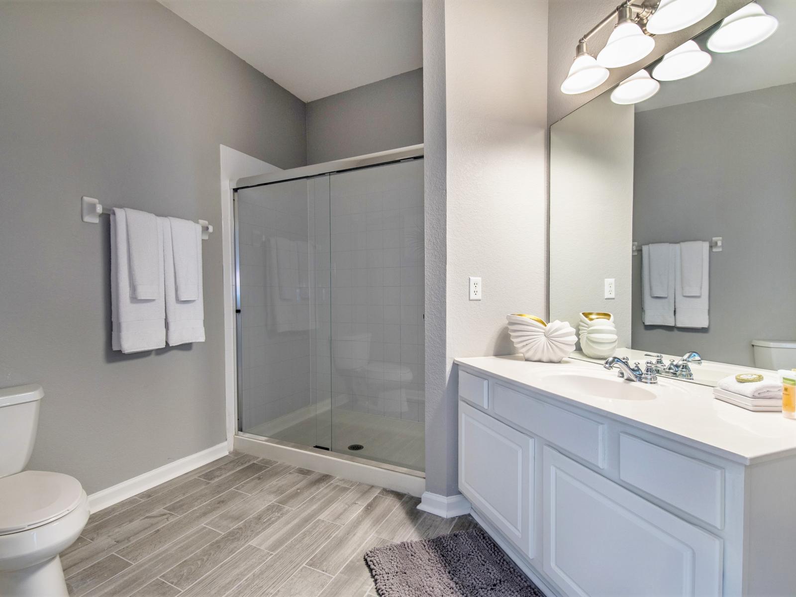 Step into luxury with our master ensuite bathroom, featuring a spacious layout, modern fixtures, and a soothing ambiance for the ultimate relaxation experience.