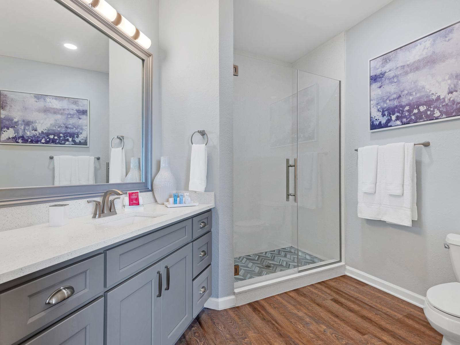 Main bathroom with walk in shower.