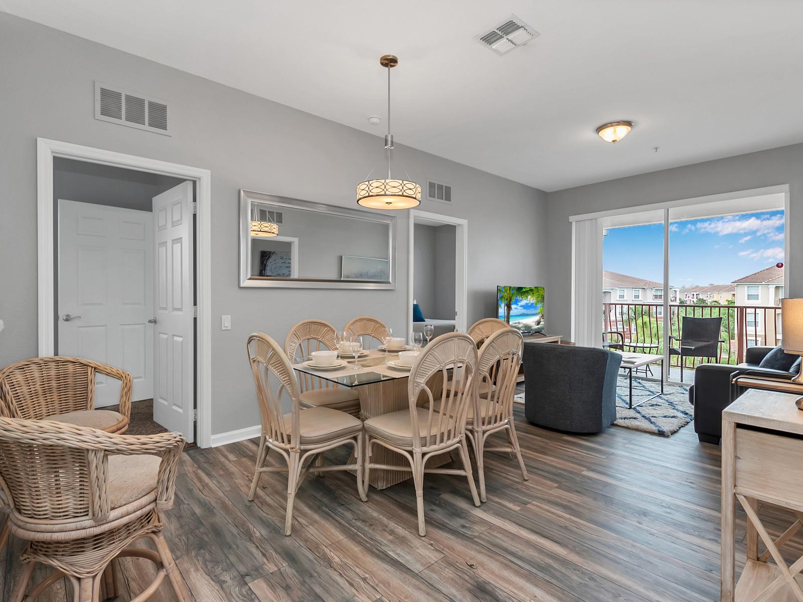 Sleek and Social: Experience the allure of our living area, harmoniously combining a contemporary kitchen and a social dining space for an urban retreat