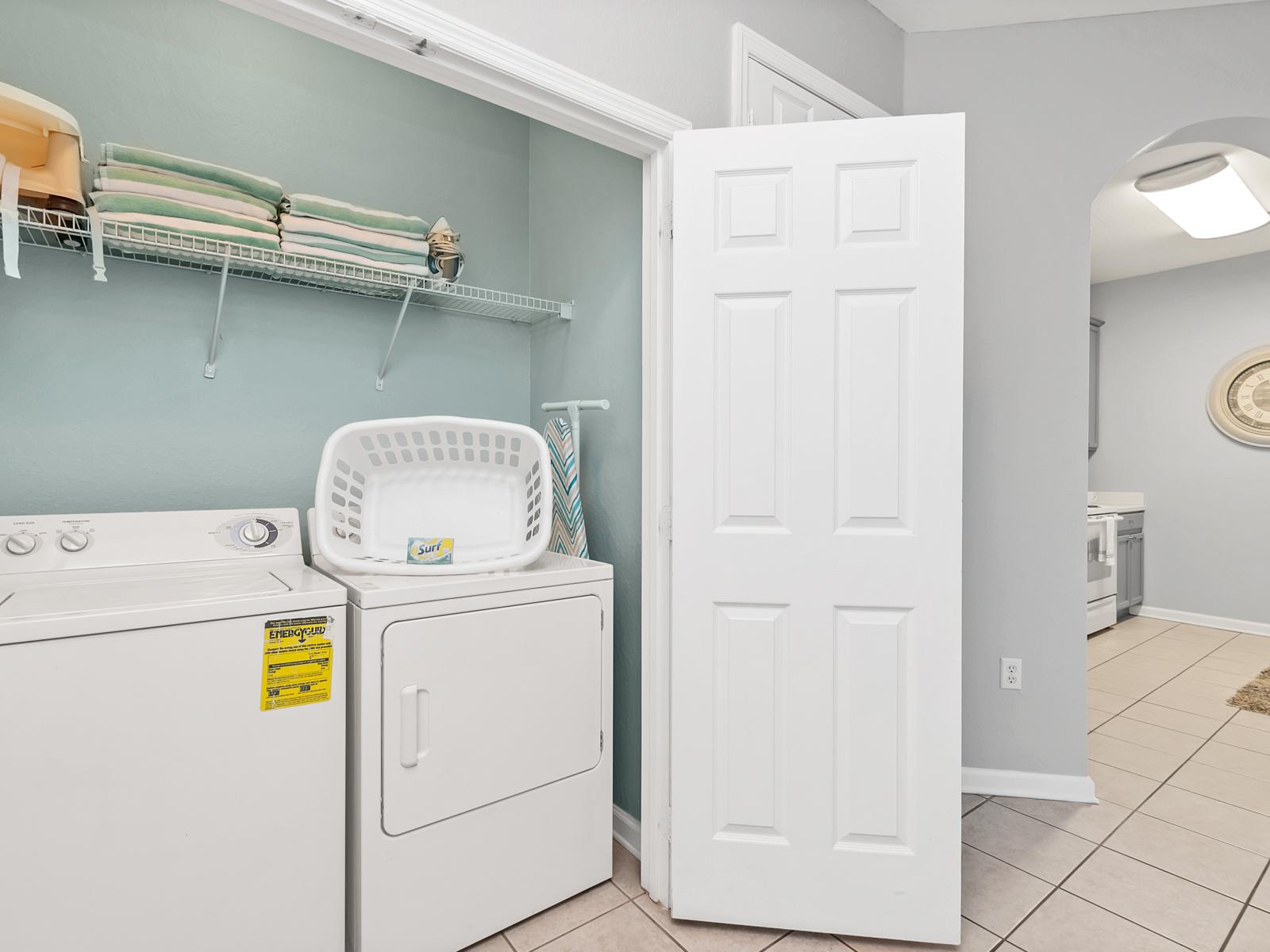 - Convenient laundry area of the condo in Orlando Florida - Step into our laundry room - Equipped with a washer and dryer - Chores become a breeze amidst convenience and comfort