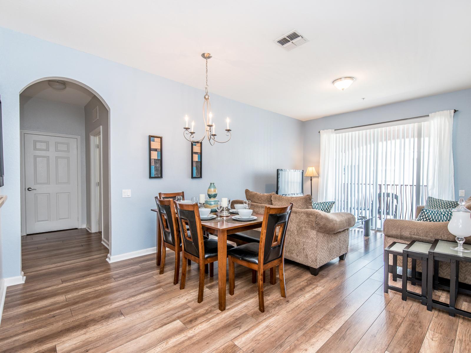 Gather around the dining area adjacent to the kitchen for memorable meals with loved ones, creating cherished moments together.