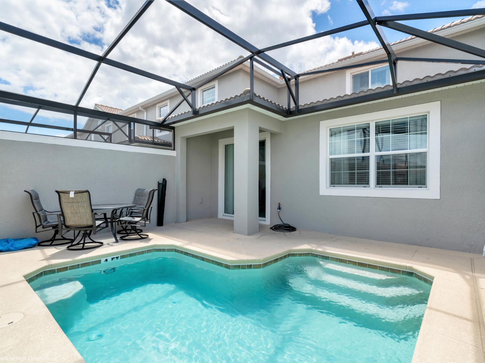 Immerse yourself with the private pool of this townhouse with outside dining area