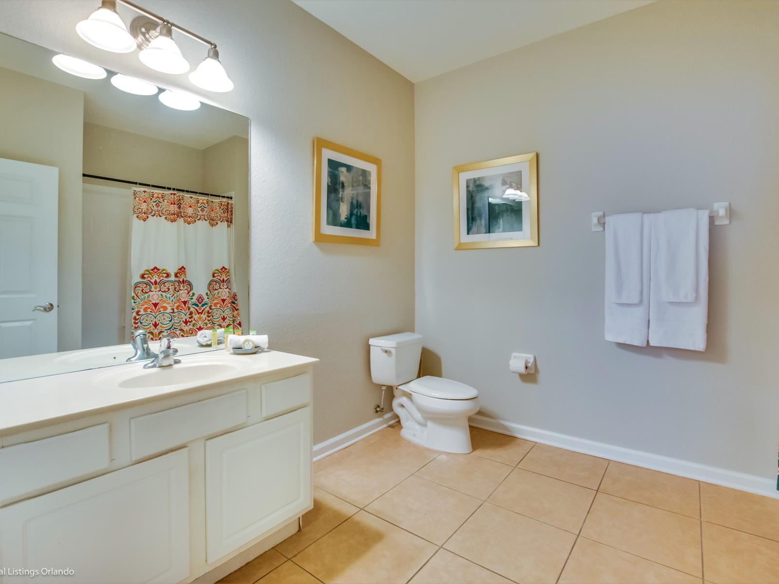 Chic toilet and vanity space, adding a touch of elegance to your daily routine.