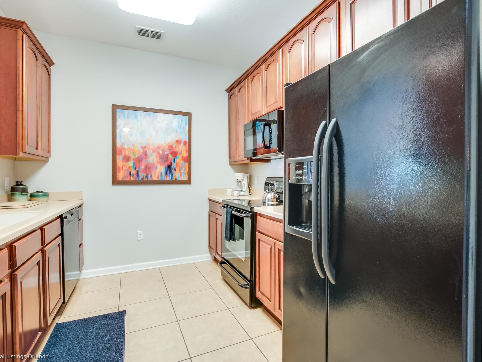 Experience the joy of cooking in the fully equipped kitchen , where modern appliances and ample space await to inspire culinary adventures and delightful dining experiences for guests to savor.