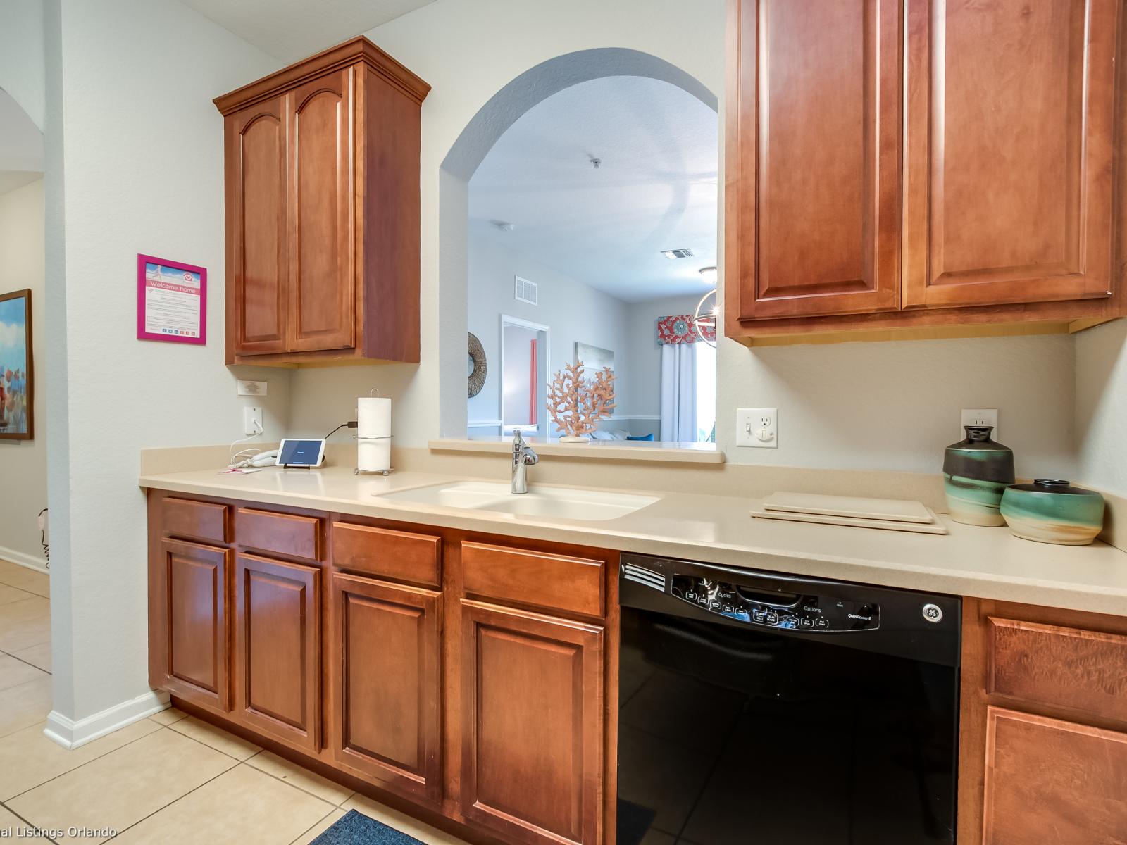 The kitchen combines style and functionality, offering guests a contemporary space to unleash their culinary creativity and enjoy the comforts of home during their stay.